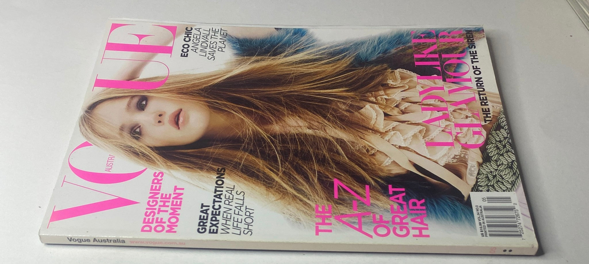 Cover of Vogue Australia Magazine May 2009 featuring Rosie Tupper, showcasing a high-fashion look with delicate sophistication, in very good condition.