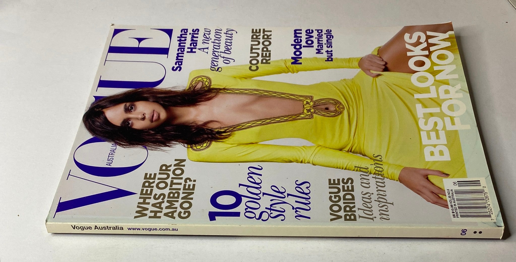 Close-up of the cover of Vogue Australia Magazine June 2010, highlighting Samantha Harris in a bright yellow outfit, emphasizing contemporary beauty and style.