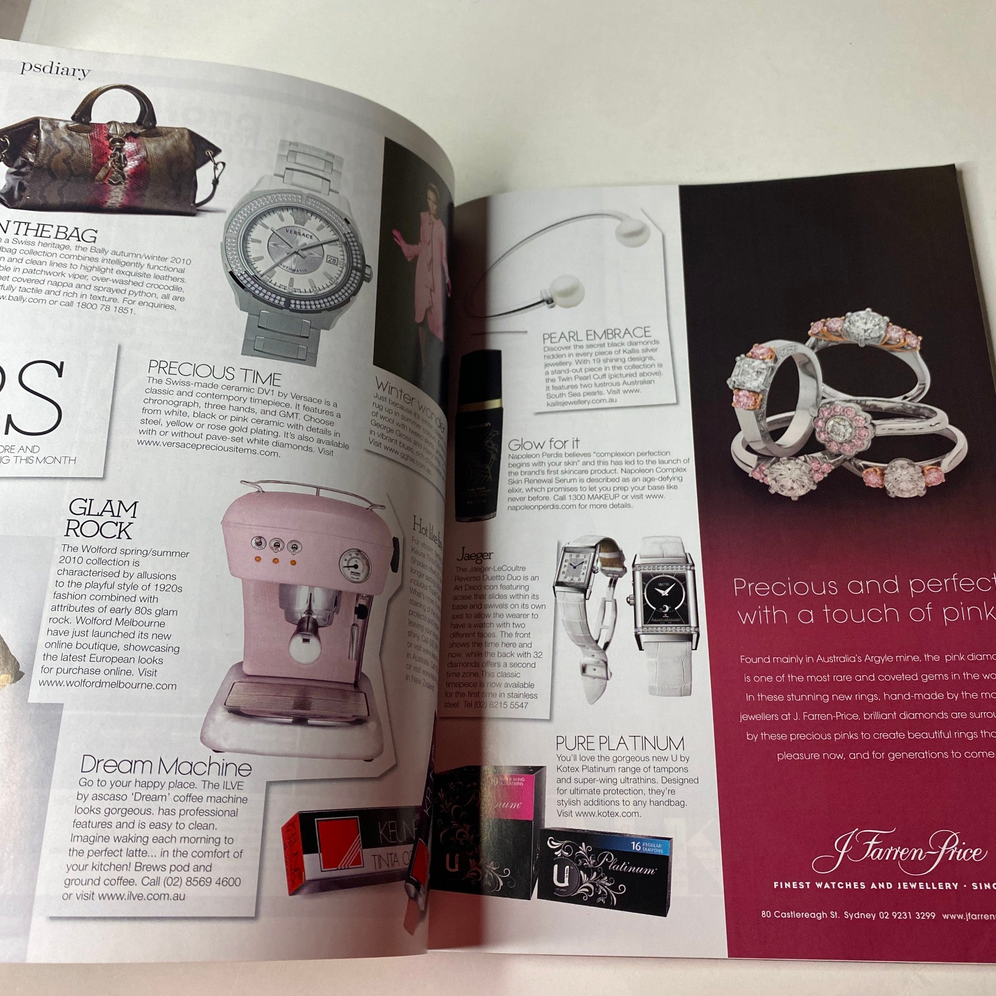 Product spread in 'Vogue Australia Magazine June 2010' presenting stylish timepieces, bags, and pink-themed jewelry, emphasizing luxury and fashion trends.