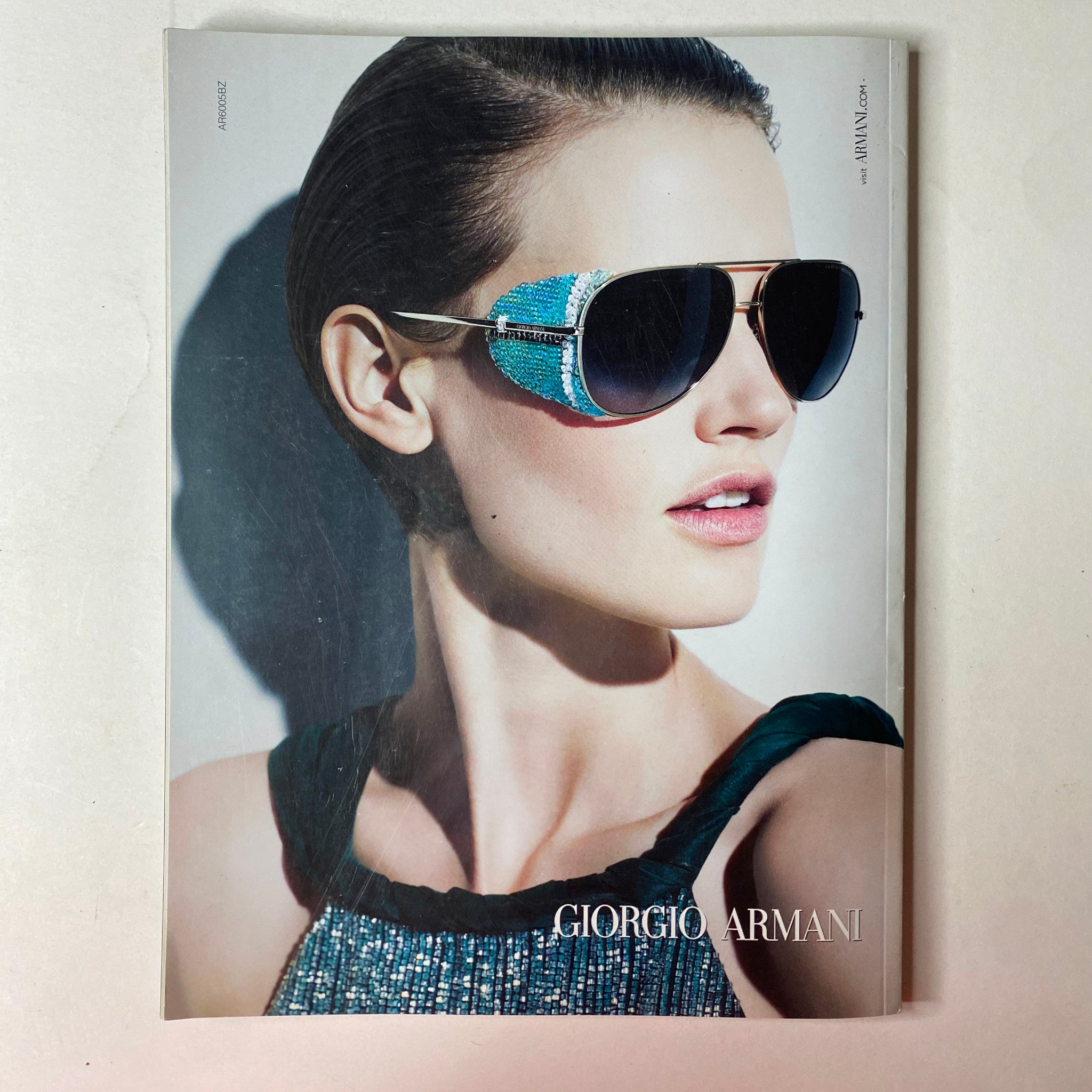 Cover of Vogue Italia Magazine June 2013 featuring Gisele Bündchen, showcasing an editorial shot that emphasizes luxury fashion by Giorgio Armani with stunning sunglasses.