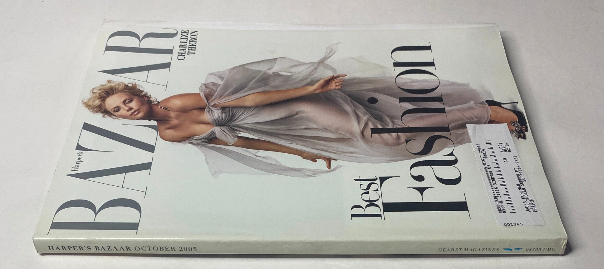 Harper's Bazaar Magazine October 2005 featuring Charlize Theron on the cover, showcasing a high-fashion look styled in Dior Haute Couture.