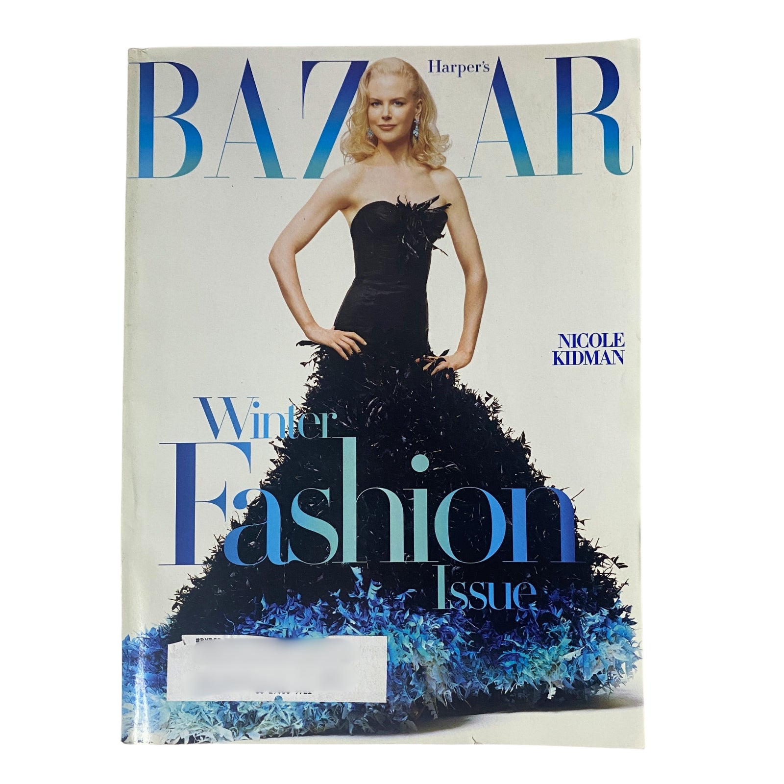 Cover of Harper's Bazaar Magazine November 2004 featuring Nicole Kidman in a stylish black dress. This issue highlights winter fashion trends and insights on personal style.