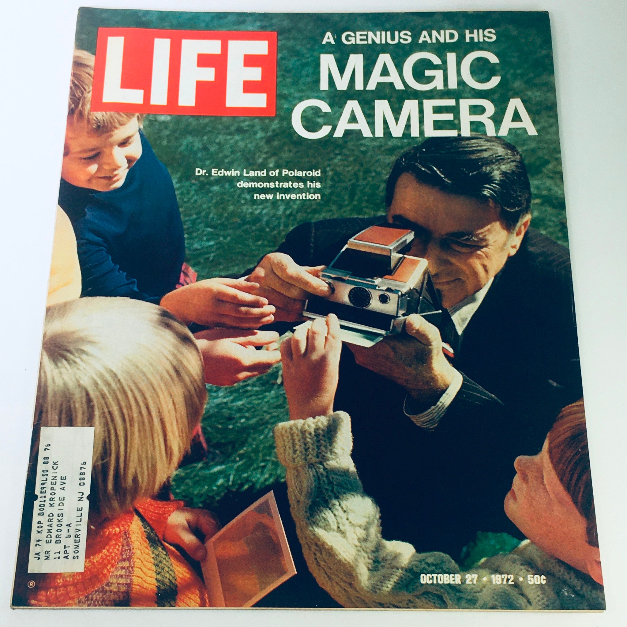 Vintage Life Magazine from October 27, 1972 featuring Dr. Edwin Land of Polaroid using his Magic Camera, showcasing children captivated by instant photography.