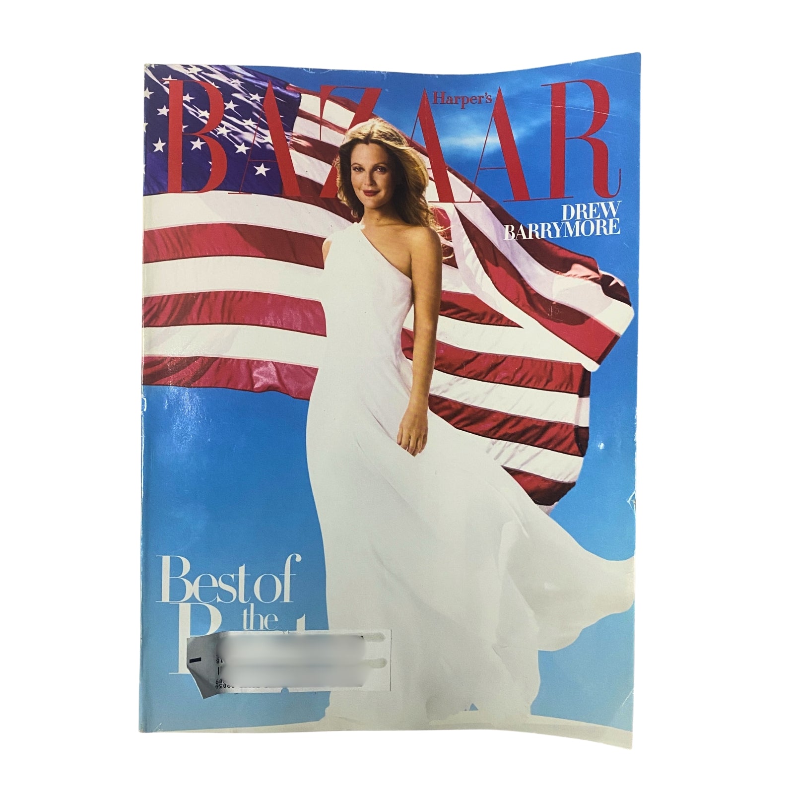 Harper's Bazaar Magazine November 2008 featuring Drew Barrymore on the cover, wearing a flowing white gown against a backdrop of the American flag, highlighting vintage fashion and culture.