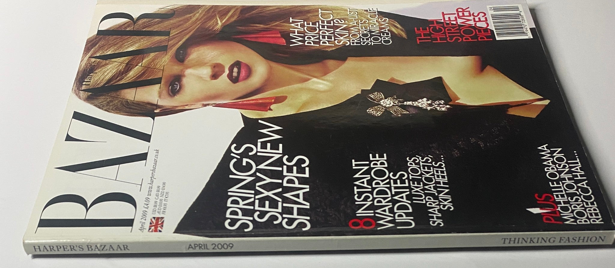Close-up view of the cover of Harper's Bazaar British Magazine April 2009 with Masha Novoselova, showcasing 'Spring's Sexy New Shapes' and notable mentions including Michelle Obama and Boris Johnson.