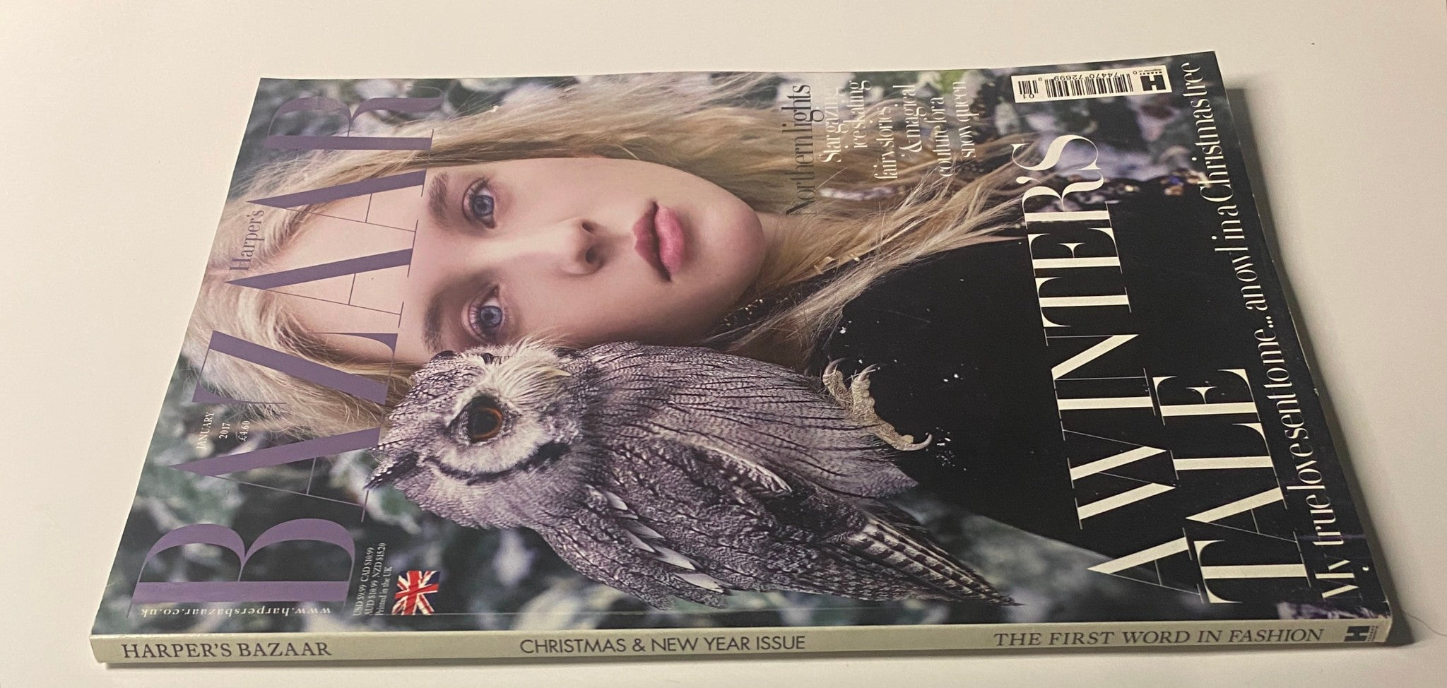 Harper's Bazaar British Magazine January 2017 cover featuring Nastya Sten and an owl. Captures the essence of the festive season with A Winter's Tale theme.