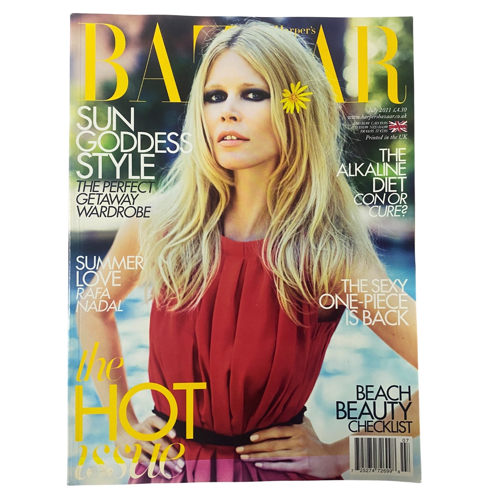 Cover of Harper's Bazaar UK Magazine July 2011 featuring supermodel Claudia Schiffer, embodying the summer style of the early 2010s with bold typography.