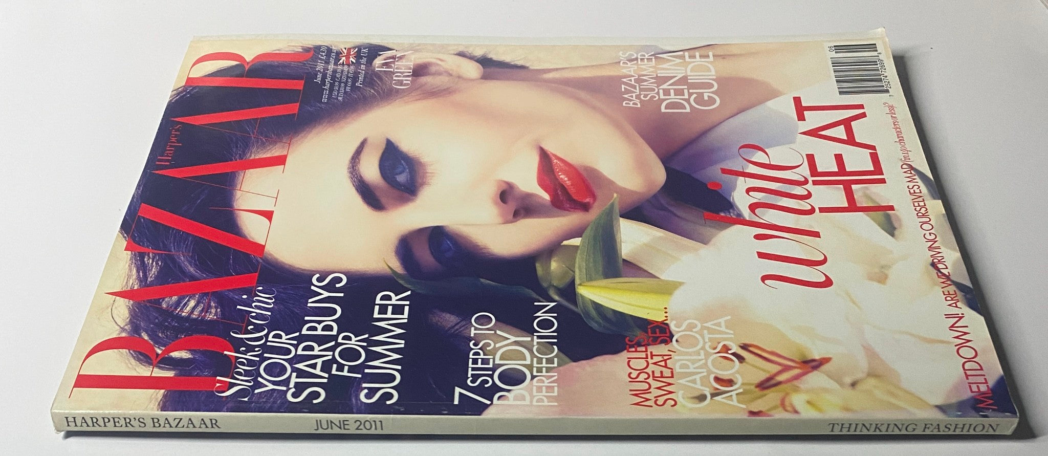 Harper's Bazaar UK Magazine June 2011 cover featuring Eva Green, showcasing high fashion with an elegant design.