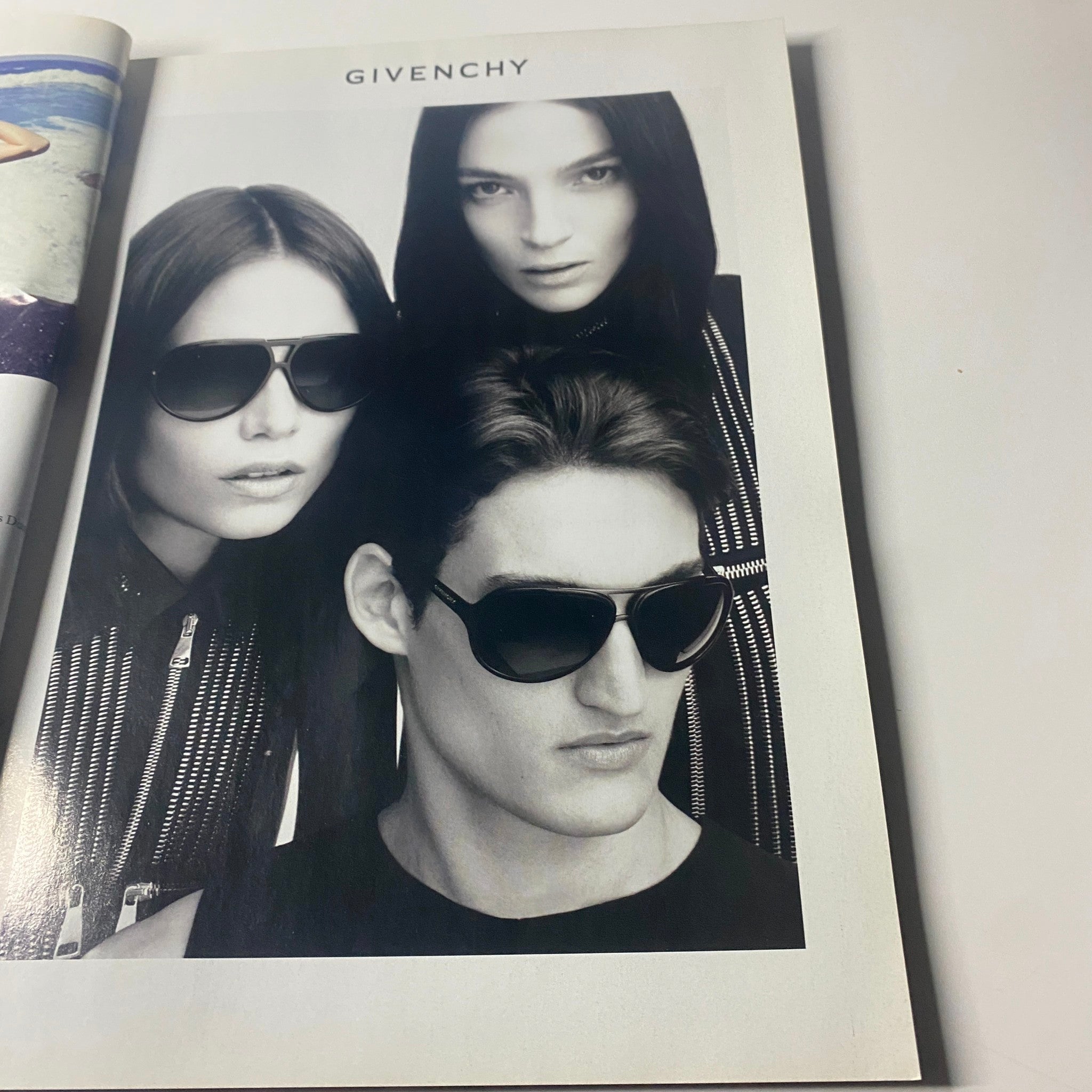 Advertorial for Givenchy from Harper's Bazaar UK Magazine May 2011 showcasing three models in stylish sunglasses, emphasizing contemporary fashion.