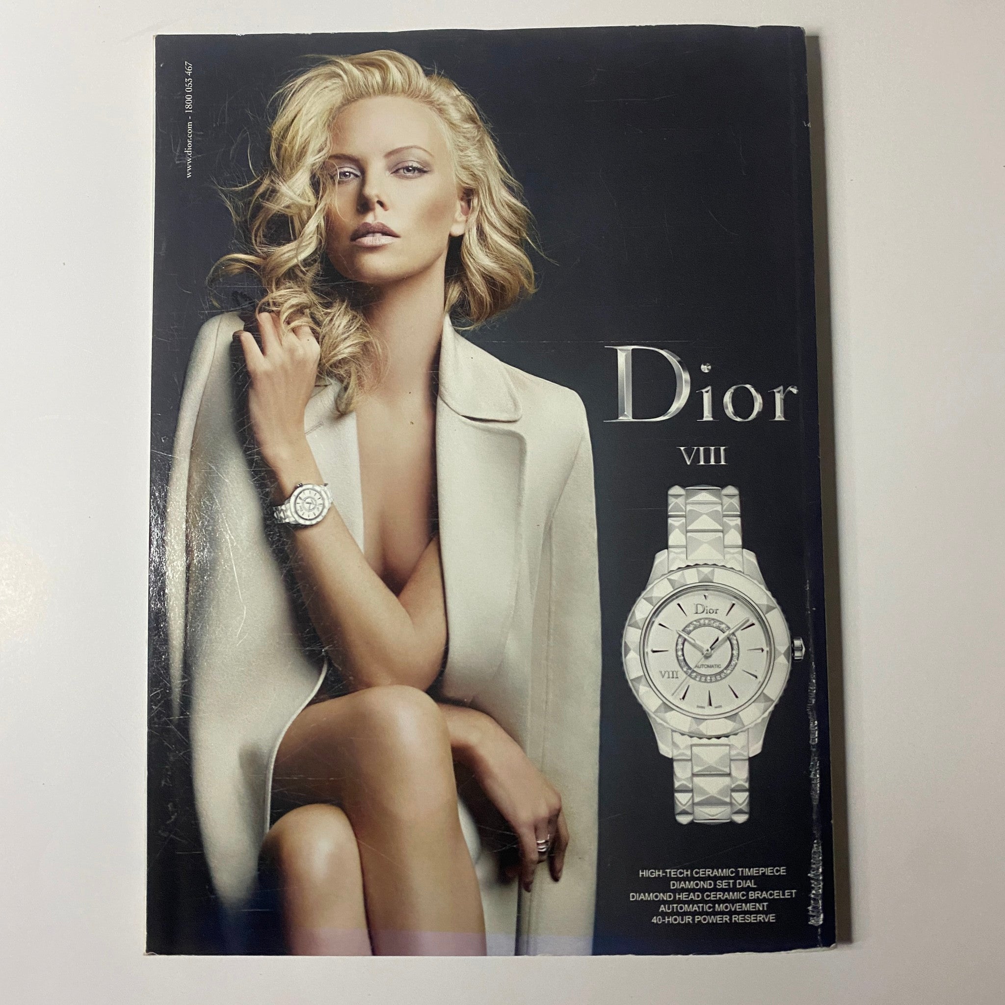 Back cover of Harper's Bazaar Australia Magazine August 2012 featuring a high fashion advertisement for Dior.