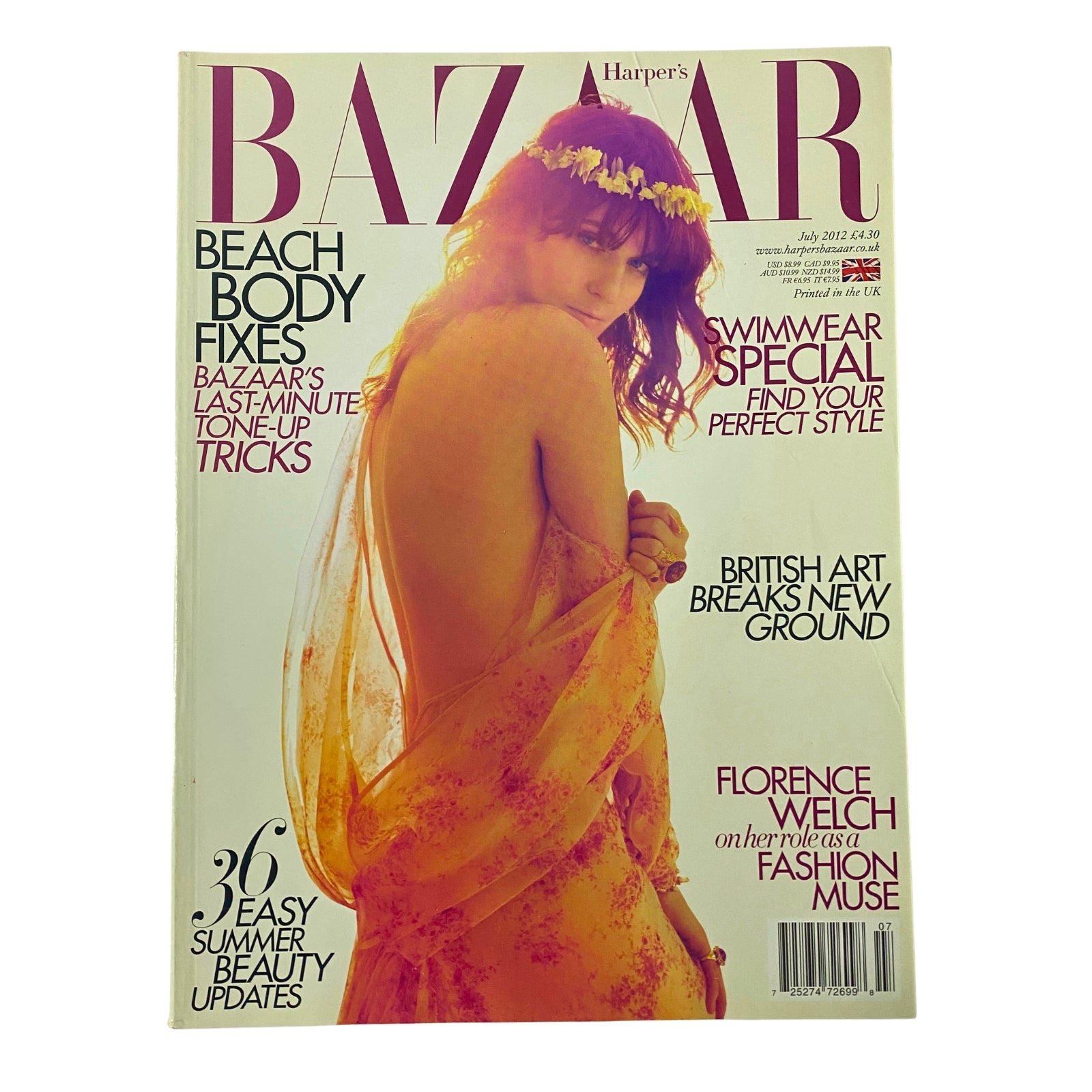 Harper's Bazaar UK Magazine July 2012 featuring Florence Welch on the cover styled in vibrant colors, showcasing summer fashion trends and beauty tips.