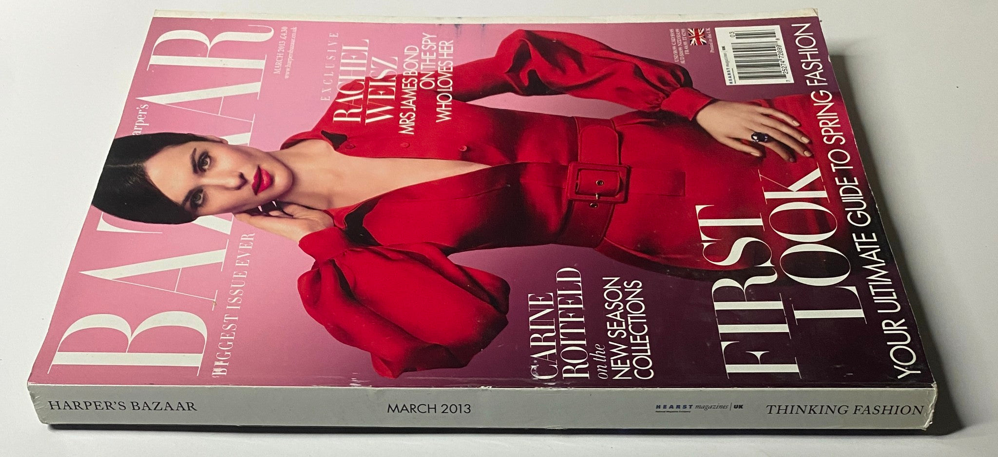 Side view of Harper's Bazaar UK Magazine March 2013 with Rachel Weisz on the cover, showcasing the vibrant colors and text - 'Carine Roitfeld on the New Season Collections'.