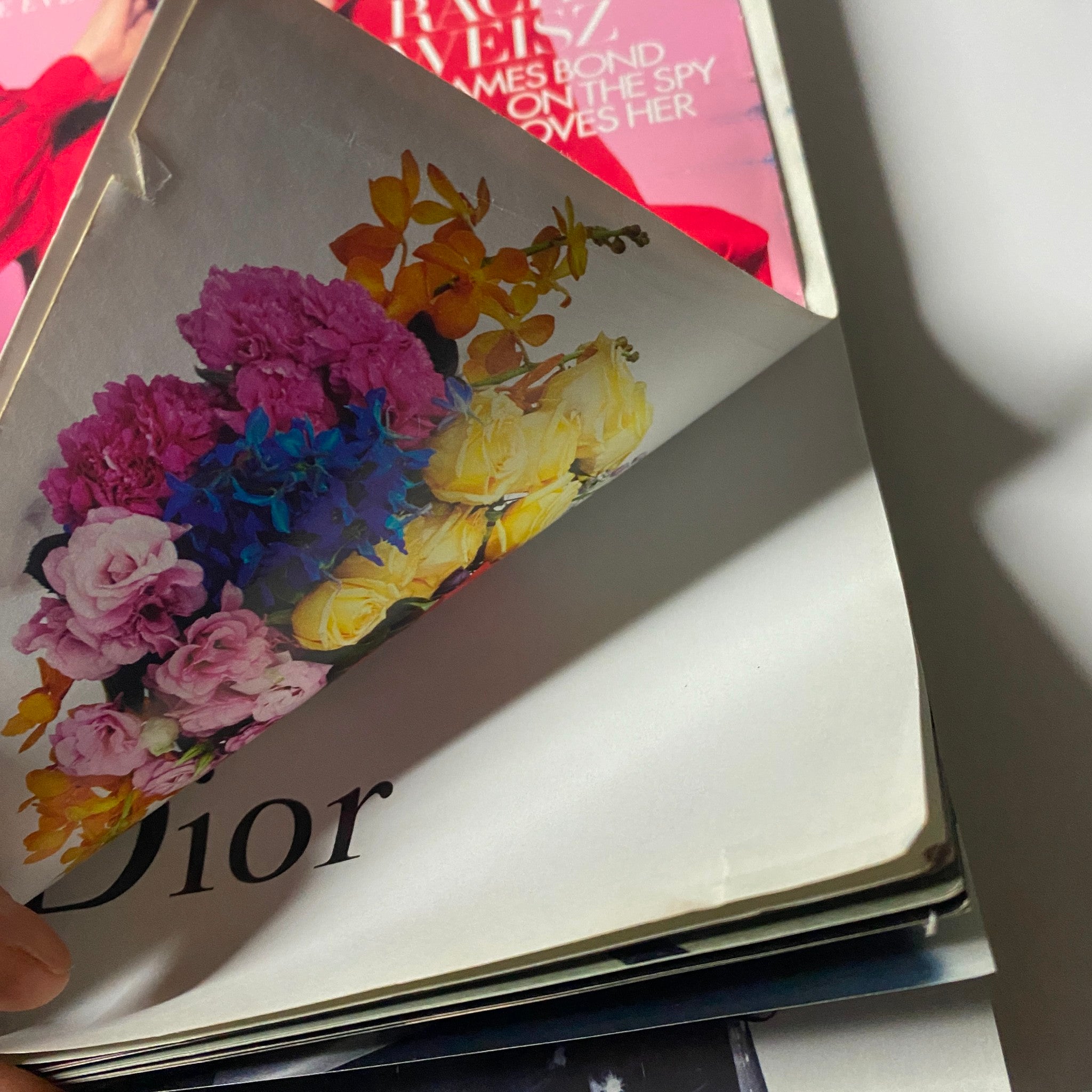 Inside view of Harper's Bazaar UK Magazine March 2013, revealing floral artwork from the Dior advertisement, featured in the issue with Rachel Weisz on the cover.