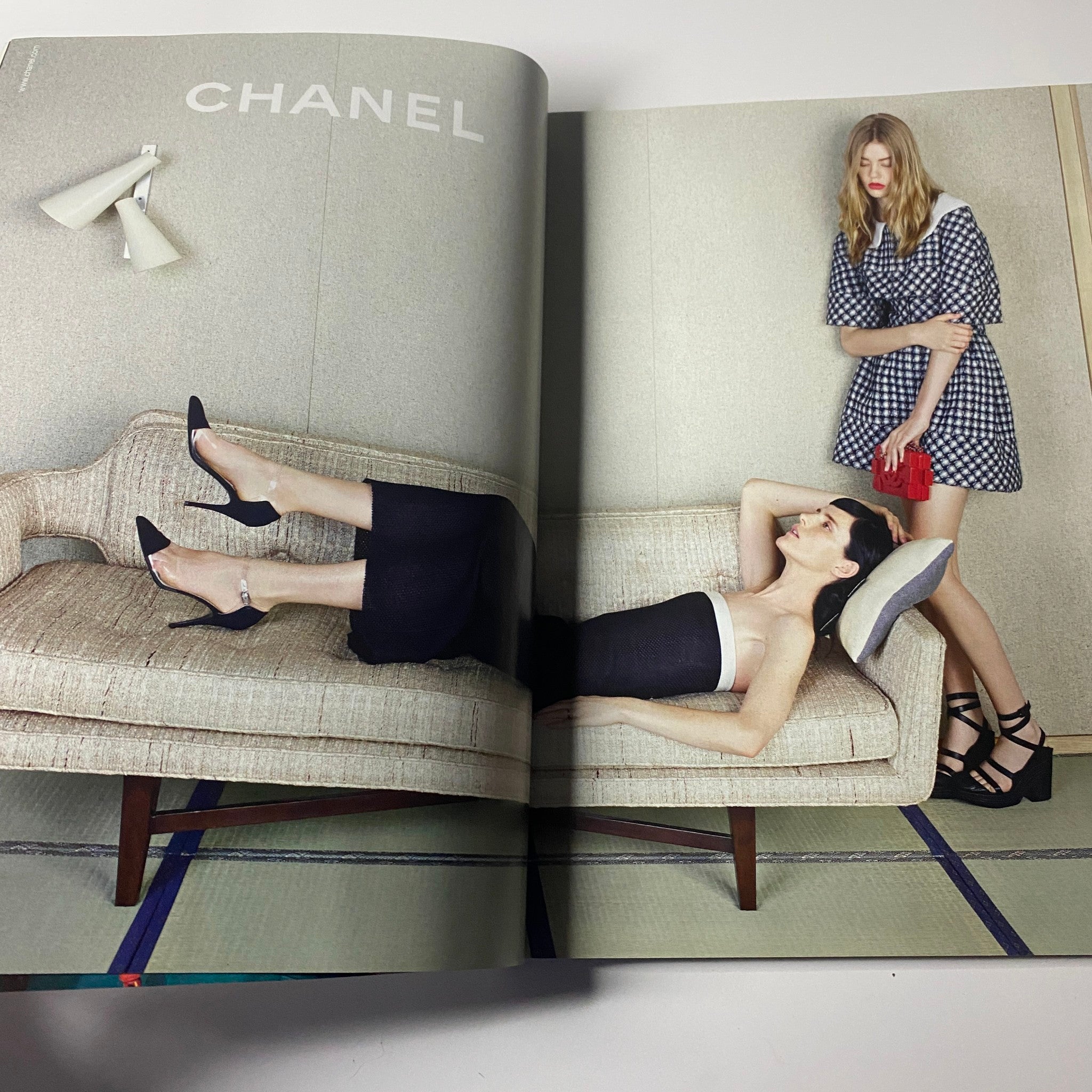 Chanel advertisement presenting models in elegant clothing and accessories, featured in the April 2013 issue of Harper's Bazaar UK with Kate Winslet on the cover.