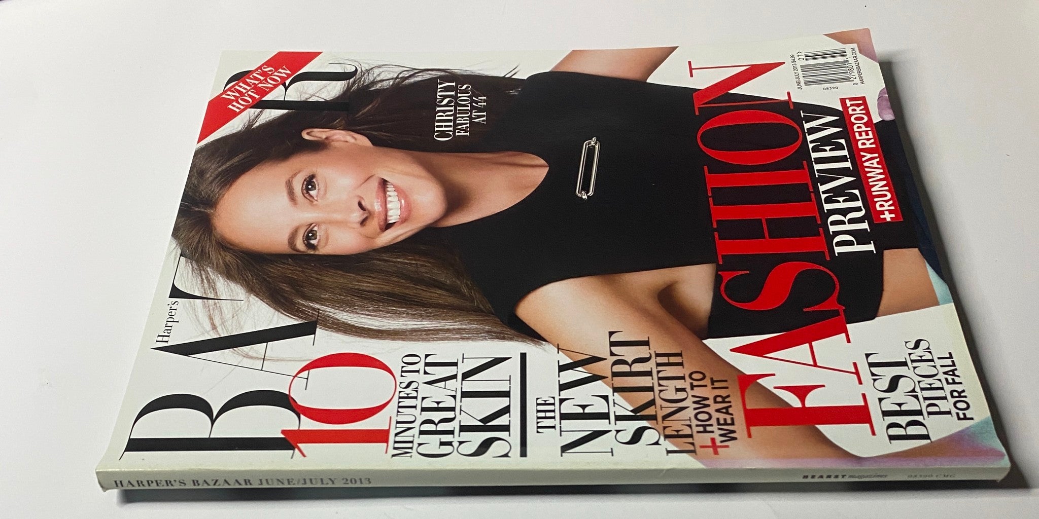 Cover of Harper's Bazaar Magazine June - July 2013 featuring Christy Turlington smiling, showcasing fashion trends and beauty insights.