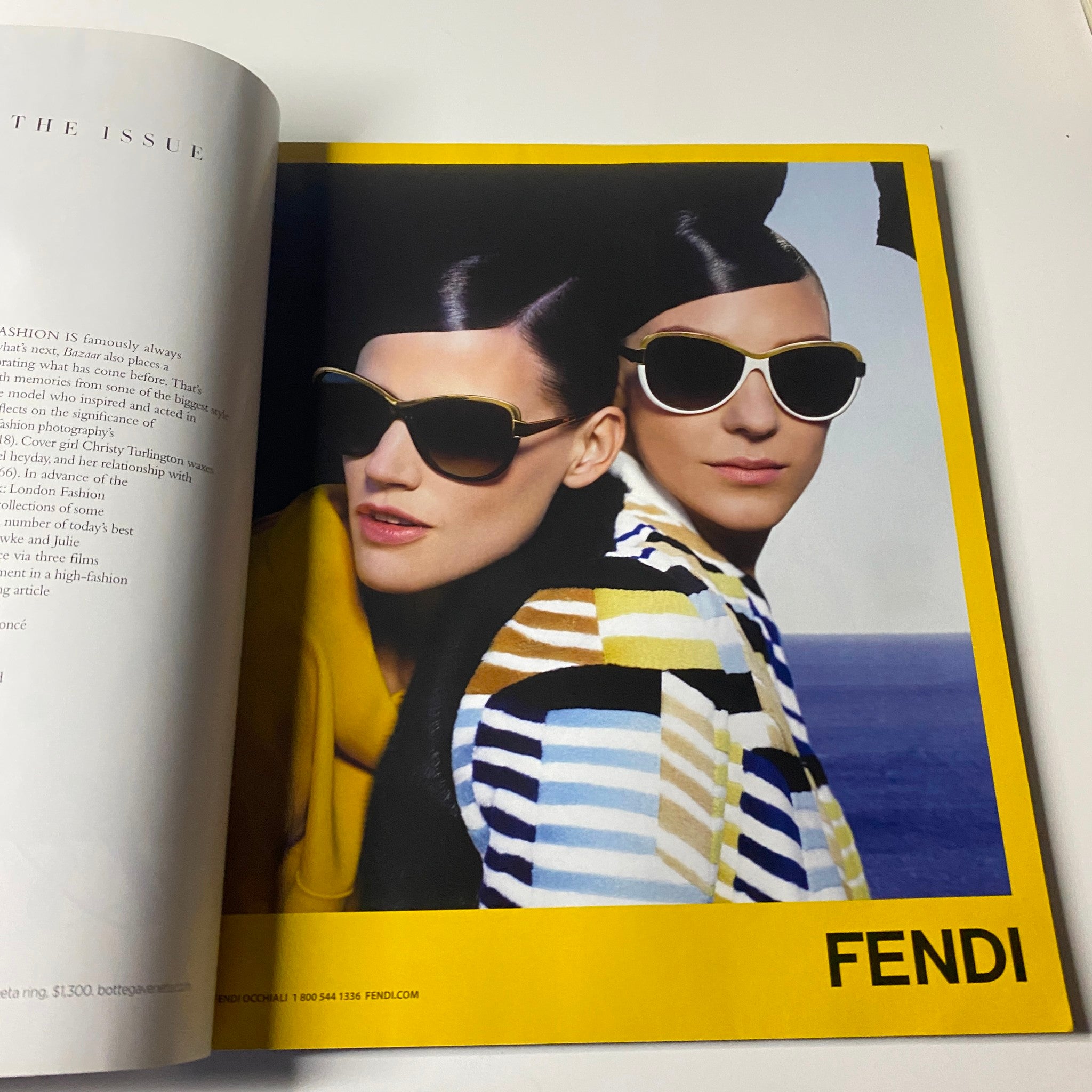 Fendi advertisement from Harper's Bazaar Magazine June - July 2013 featuring two models wearing fashionable sunglasses against a vibrant background.