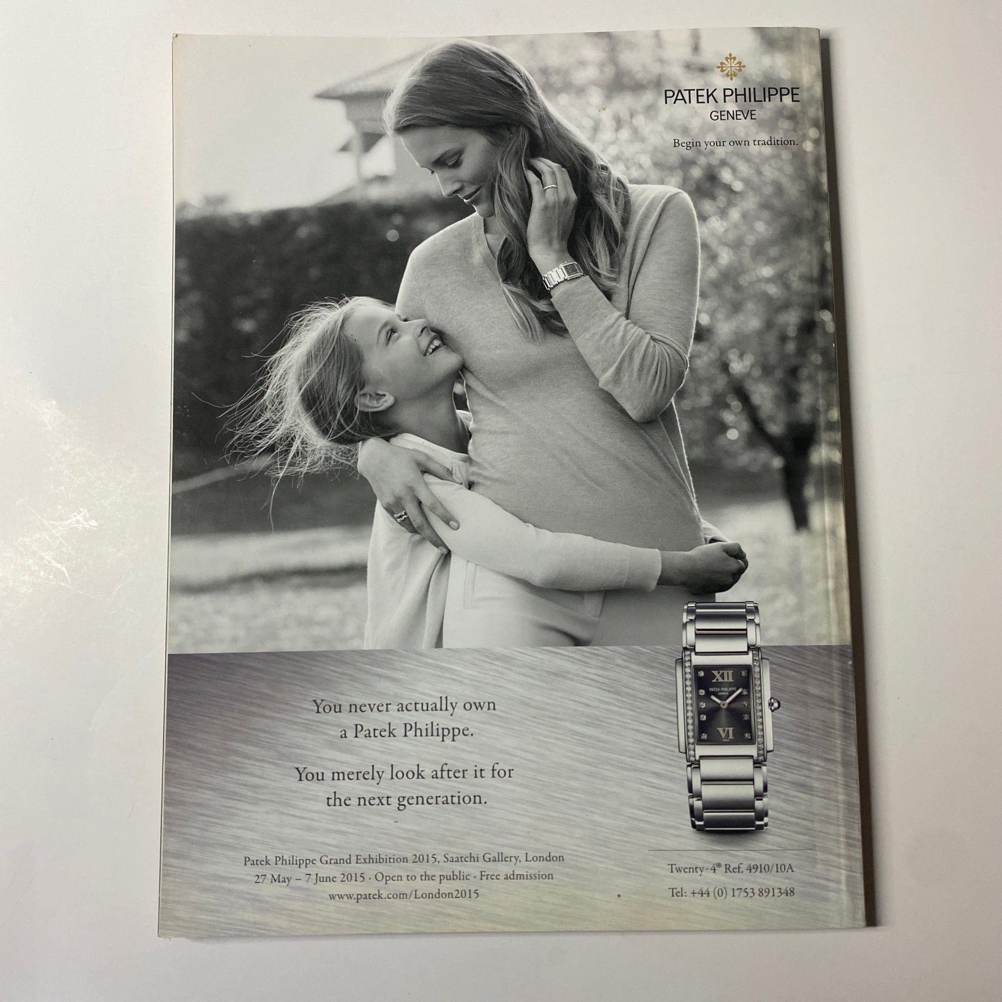Advertisement for Patek Philippe featuring a mother and daughter with a luxury watch, as seen in Harper's Bazaar UK Magazine July 2015 Alexa Chung Cover No Label VG.