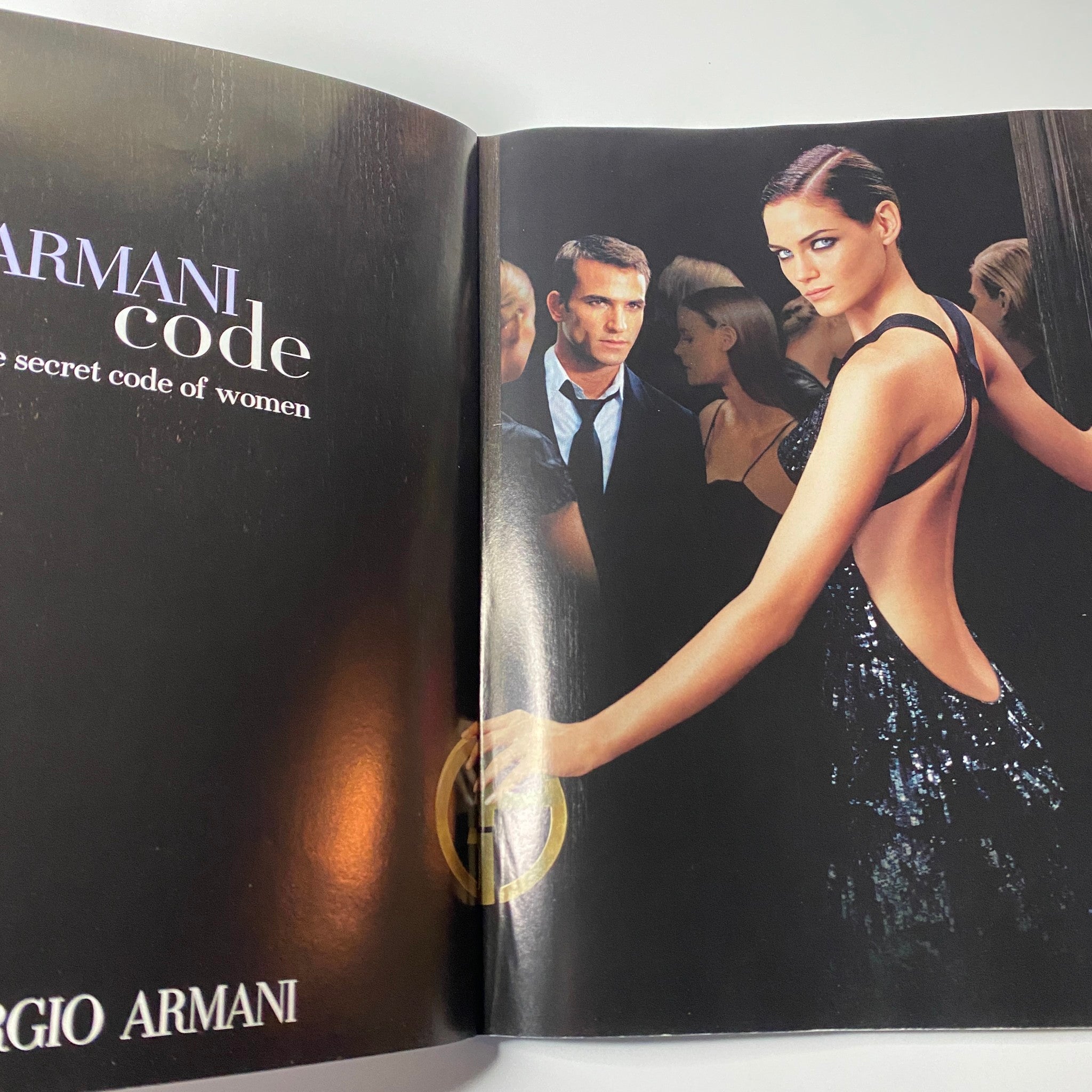 Stylish advertisement for Armani Code presented in the Harper's Bazaar Australia Magazine October 2006, showcasing elegant fashion and lifestyle themes.