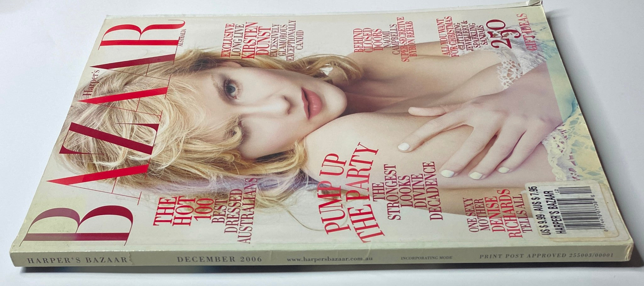Another perspective of the cover of Harper's Bazaar Australia Magazine December 2006 showcasing Kirsten Dunst and festive themes.