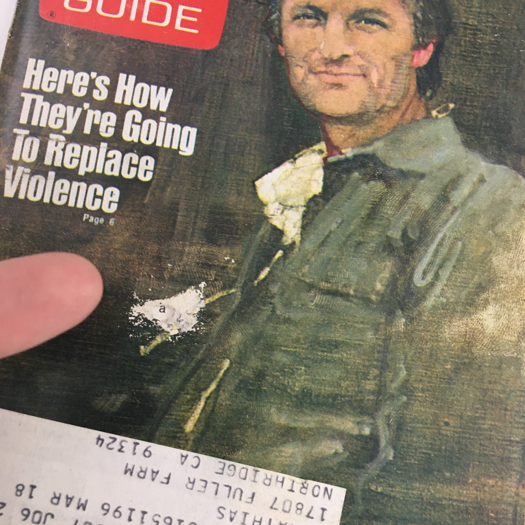 Close-up of the TV Guide Magazine June 4, 1977 cover, highlighting Alan Alda of 'M.A.S.H.' and details about replacing violence on TV.
