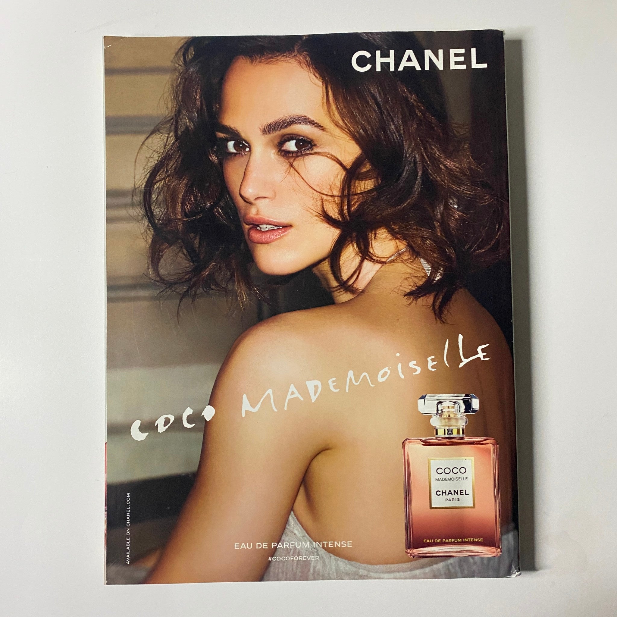 Chanel Coco Mademoiselle fragrance advertisement featuring a model with wavy hair promoting the Eau de Parfum, from Harper's Bazaar UK Magazine November 2019.