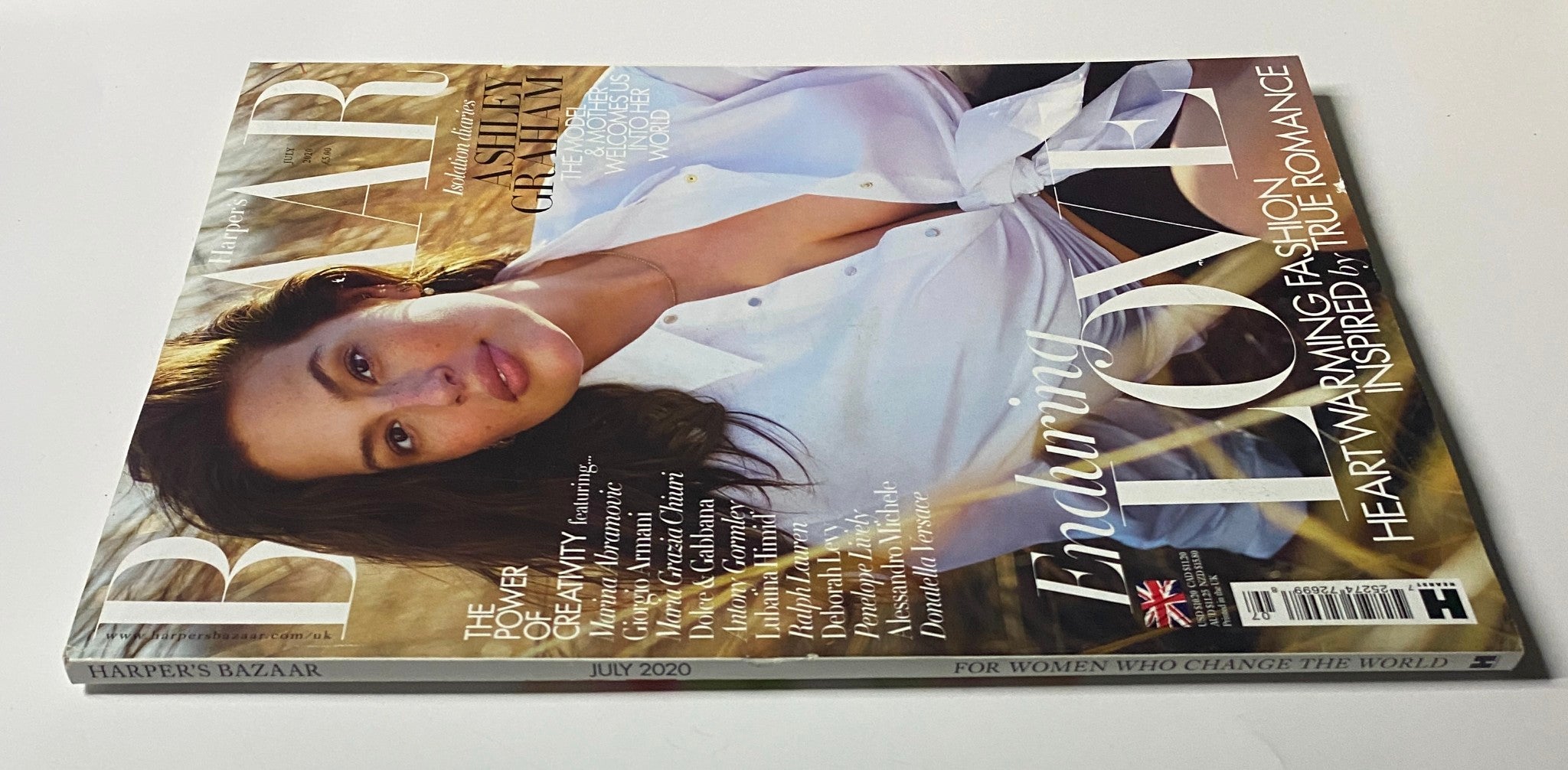 Harper's Bazaar UK Magazine July 2020 with Ashley Graham on the cover, presenting a glimpse of heartfelt fashion narratives and creative storytelling.