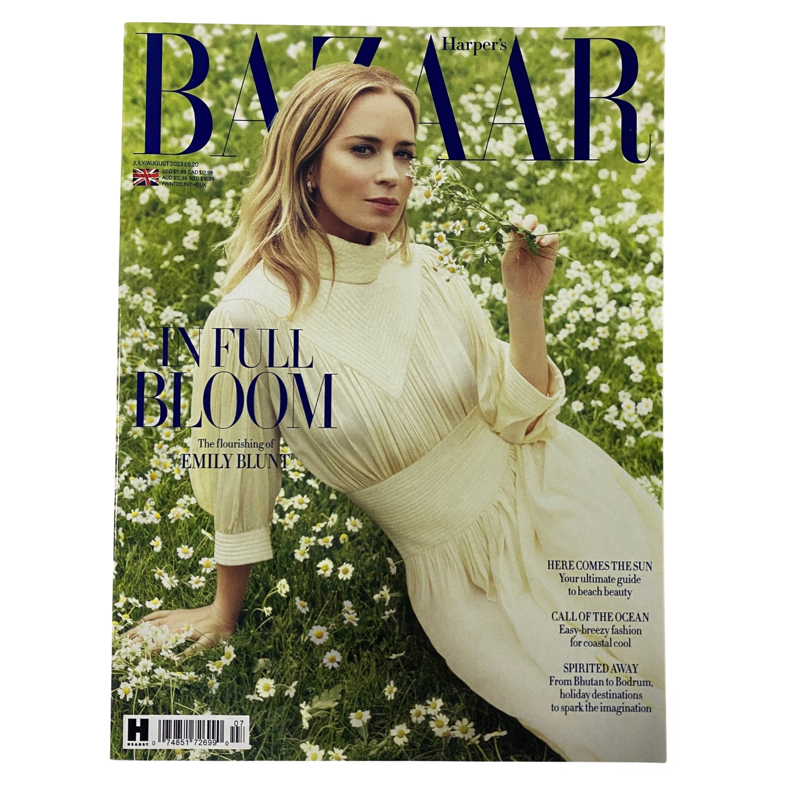 Harper's Bazaar UK Magazine July August 2023 featuring Emily Blunt on the cover, styled in a white dress surrounded by flowers, highlighting the theme 'In Full Bloom'.
