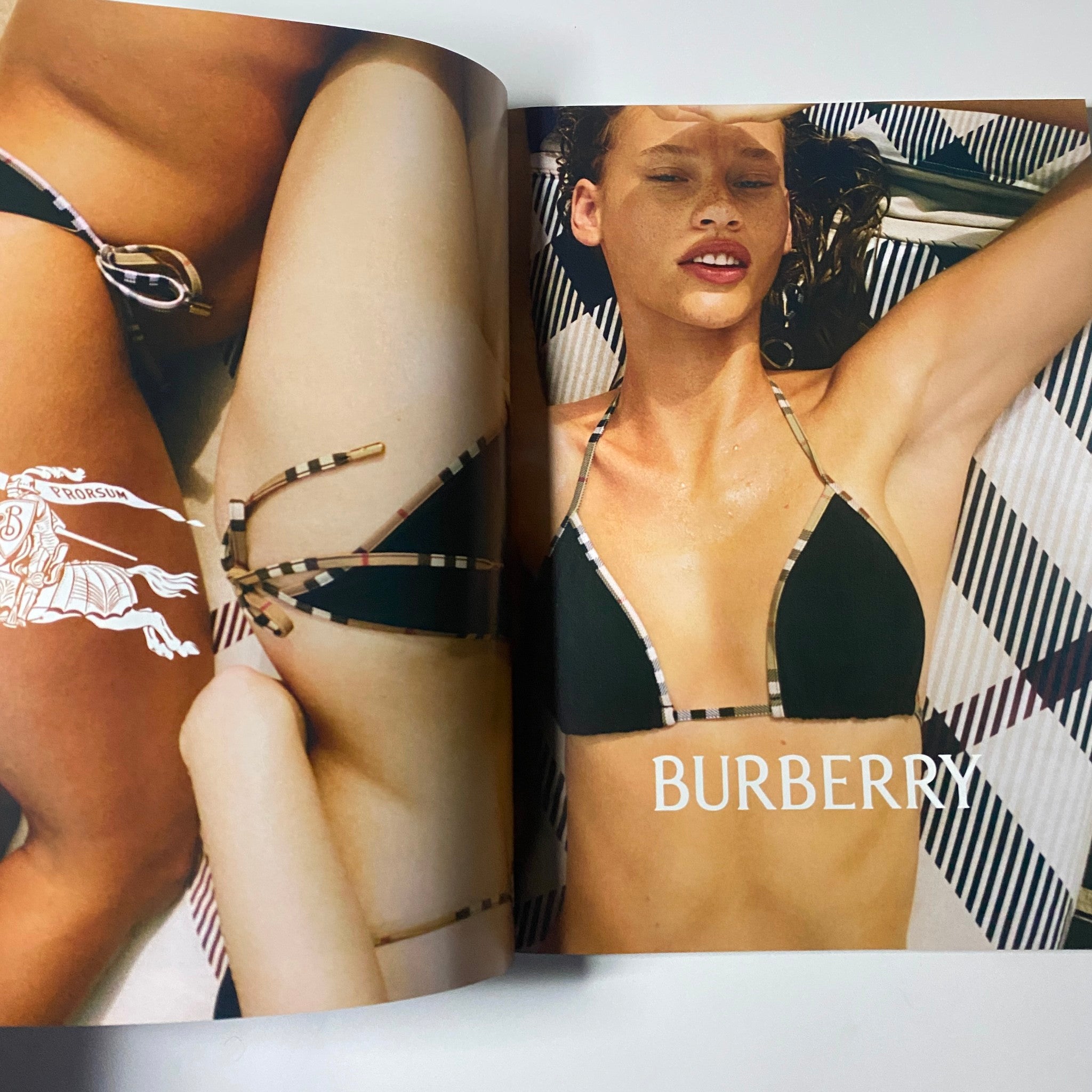Harper's Bazaar UK Magazine July August 2023 featuring a fashionable editorial spread with a model wearing Burberry swimwear, representing summer styles.