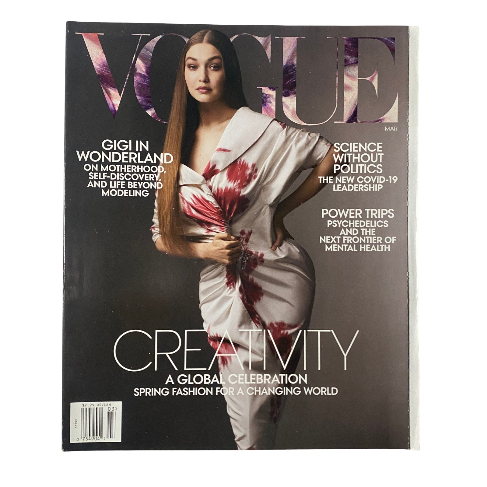Vogue Magazine March 2021 cover featuring Gigi Hadid in a stylish floral dress, highlighting the theme of creativity and fashion.