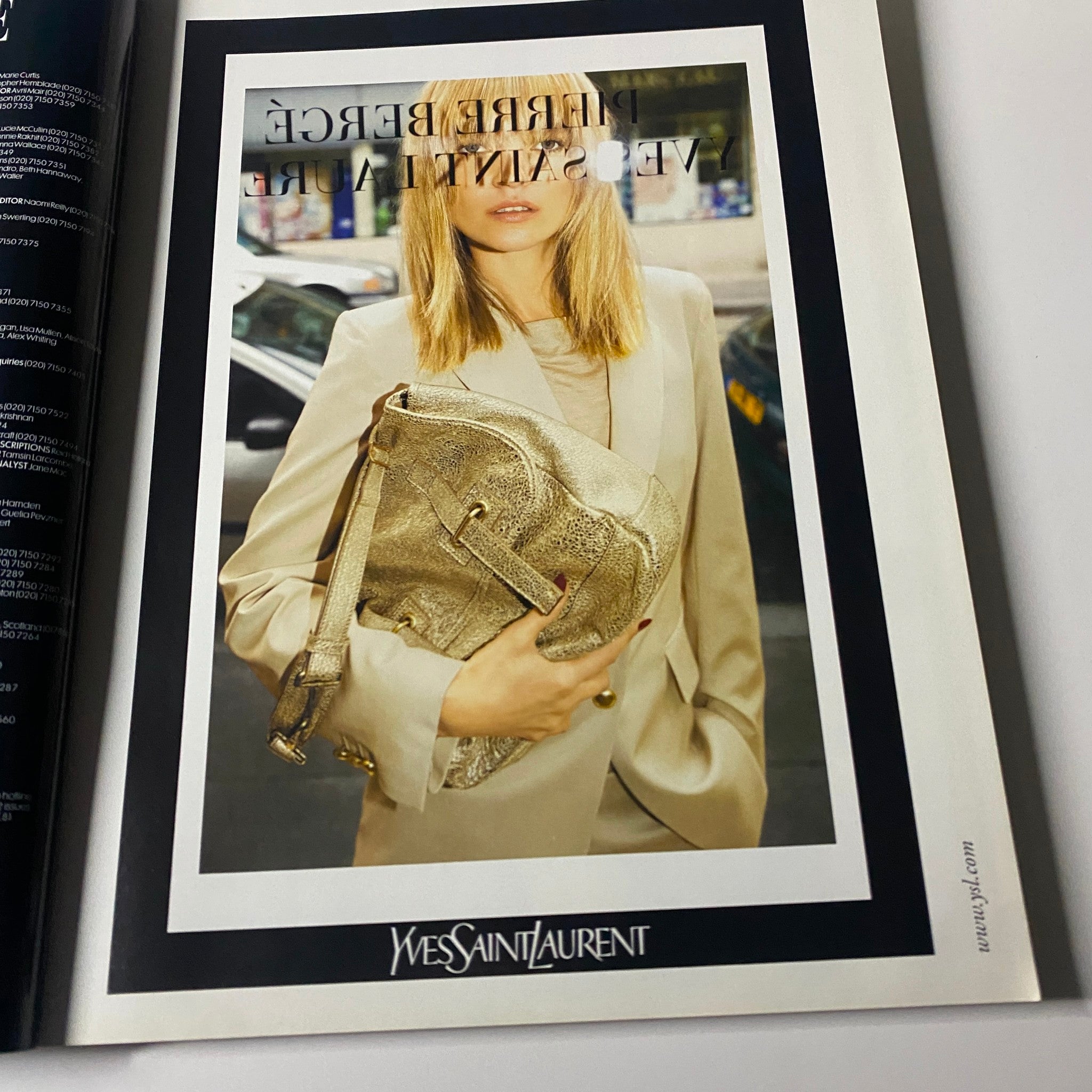 Elle UK Magazine April 2008 Kate Hudson Cover featuring a YSL advertisement showcasing a model in elegant attire holding a stylish handbag.