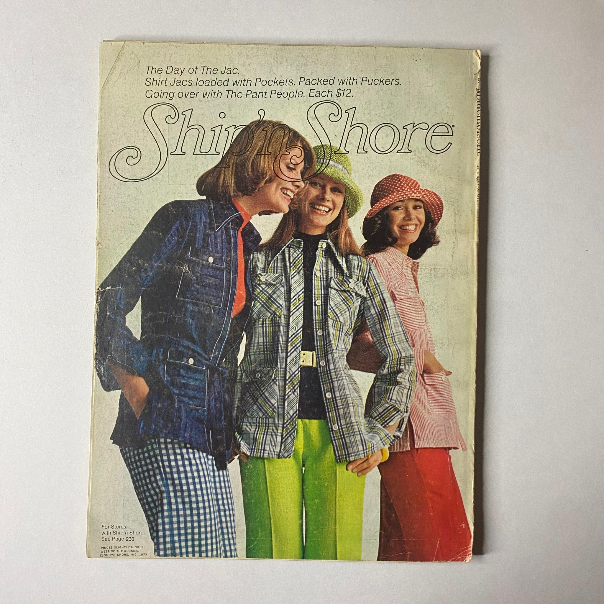 Cover of Mademoiselle Magazine March 1973 titled 'Woman Loves Work' by Amy Gross featuring three women showcasing 1970s fashion in vibrant outfits and stylish hairstyles against a retro background.