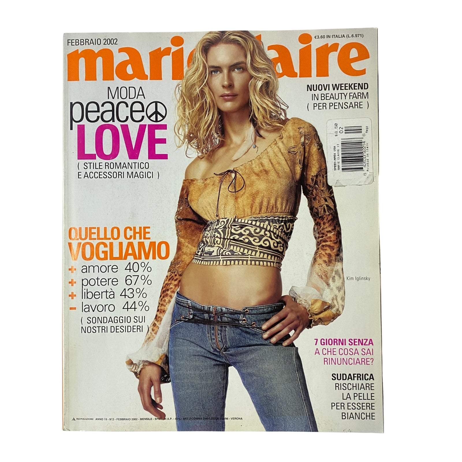 Cover of Marie Claire Italia Magazine February 2002 featuring model Kim Iglinsky in a stylish outfit. The cover showcases themes of peace and love, highlighting fashion and cultural insights.
