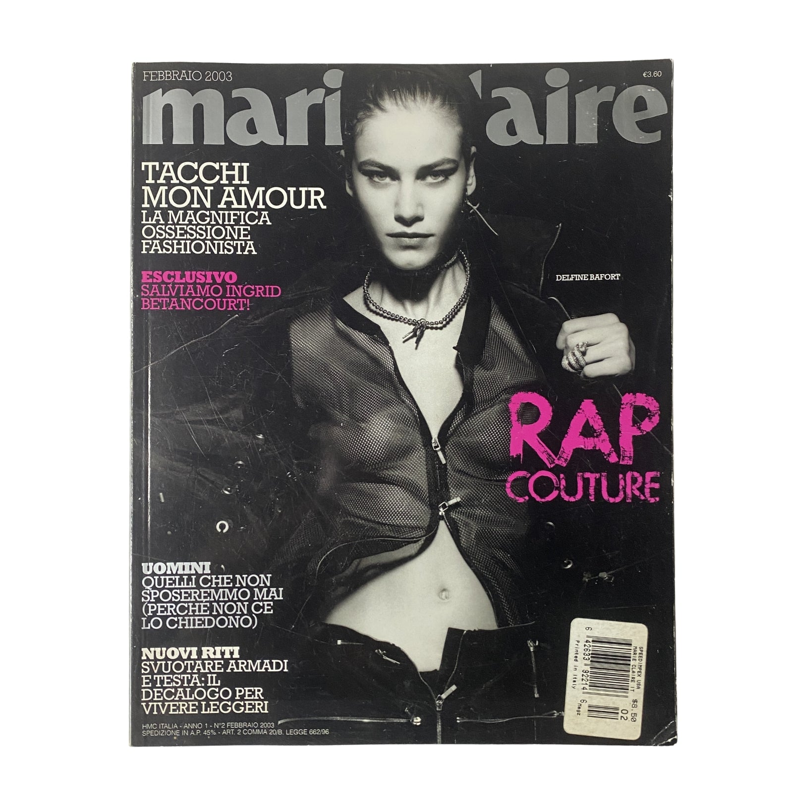 Cover of Marie Claire Italia Magazine February 2003 featuring Delfine Bafort, highlighting fashion themes like 'Rap Couture'. The magazine showcases early 2000s Italian fashion and culture.