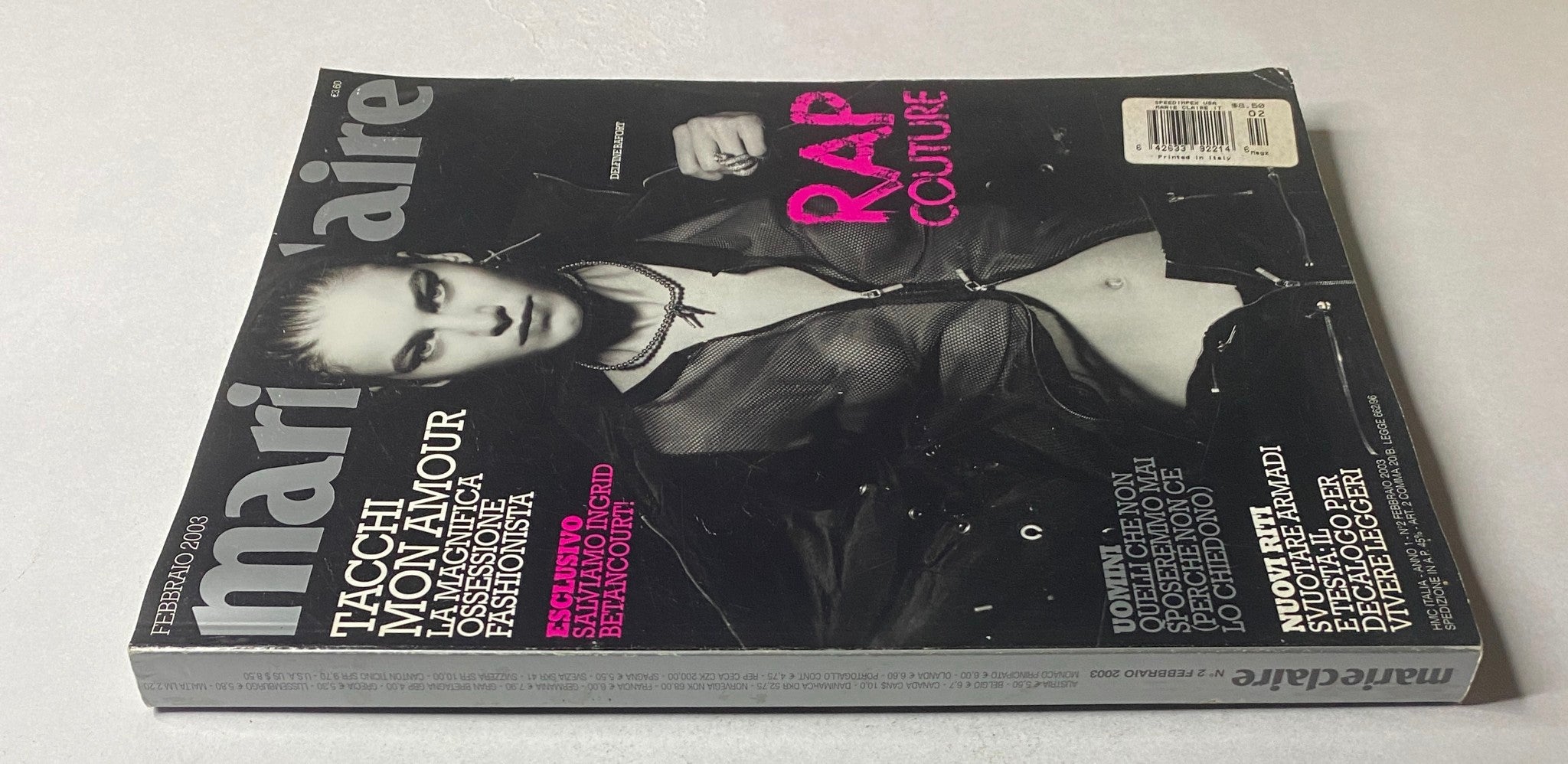 Side view of Marie Claire Italia Magazine February 2003 featuring Delfine Bafort on the cover, exploring themes such as 'Rap Couture' and showcasing vintage Italian fashion.
