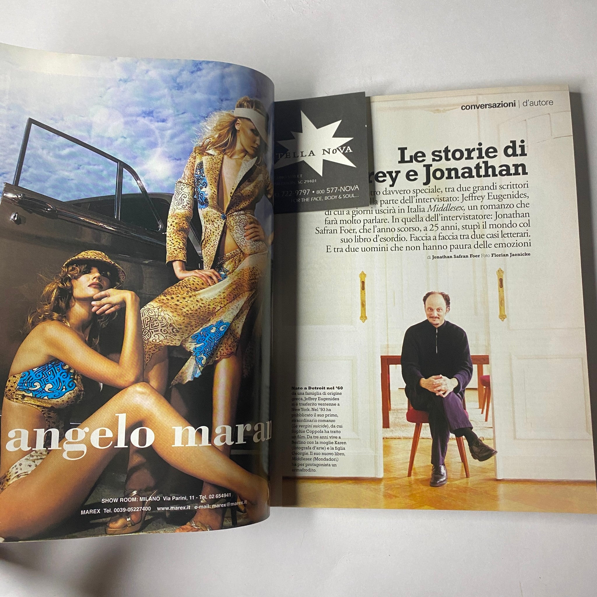 An editorial spread from Marie Claire Italia Magazine April 2003 featuring high-fashion photography and an interview segment with notable figures.