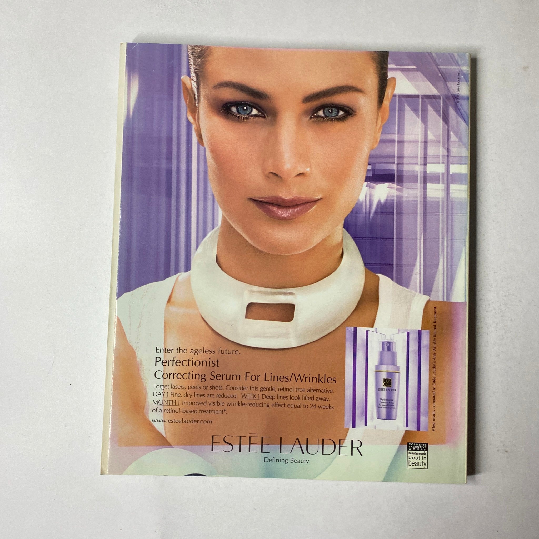 Estee Lauder advertisement in The Oprah Magazine October 2003 promoting the Perfectionist Correcting Serum for lines and wrinkles.