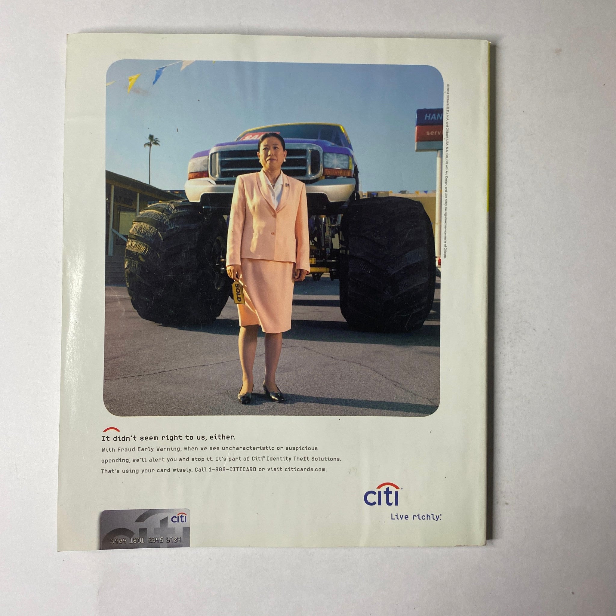 Back cover of The Oprah Magazine July 2004 featuring an advertisement for Citi, emphasizing financial services with a unique visual of a woman next to a large truck.