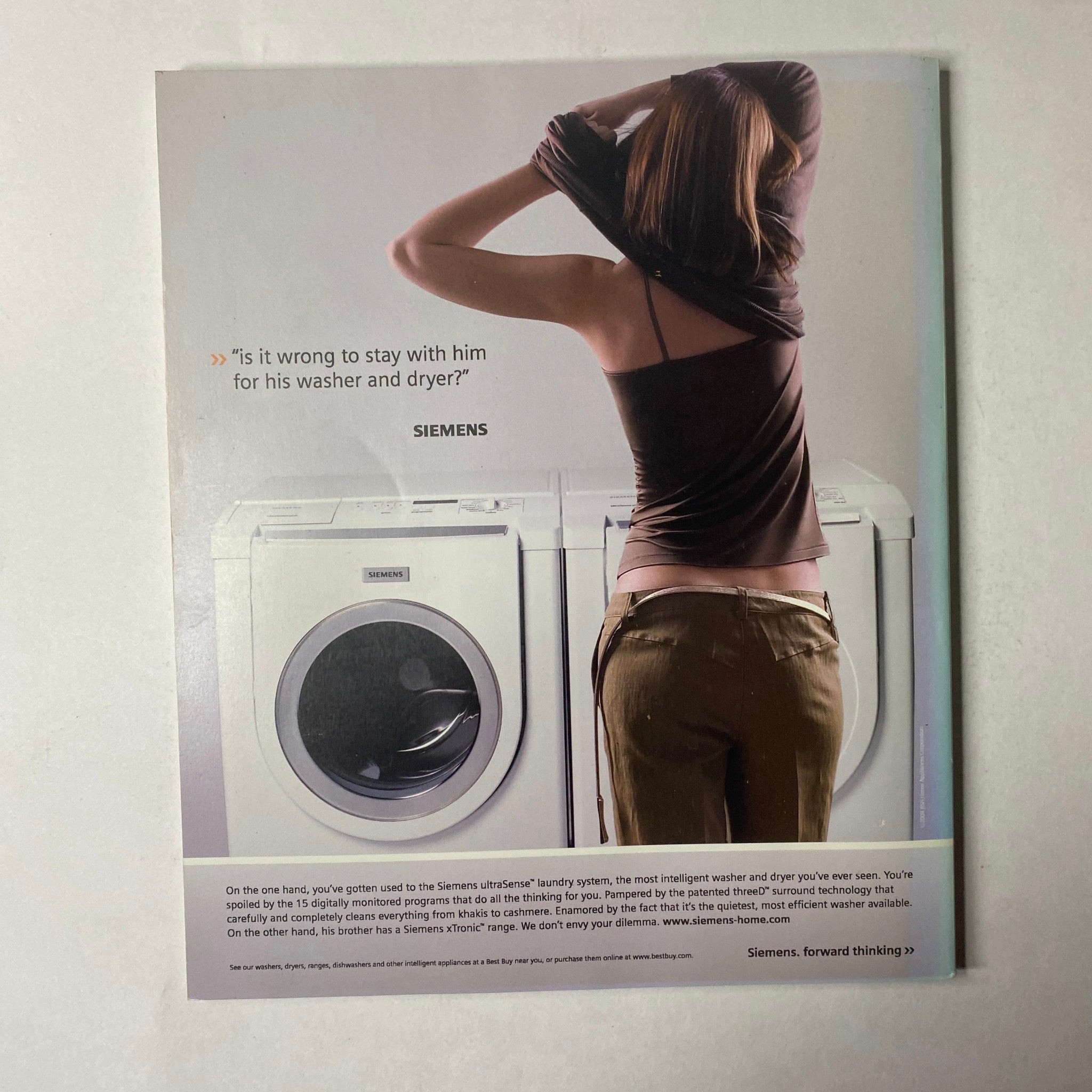 A promotional page from Breathe Magazine January-February 2005 featuring an advertisement for Siemens laundry systems, illustrating lifestyle choices and modern conveniences in mindful living.