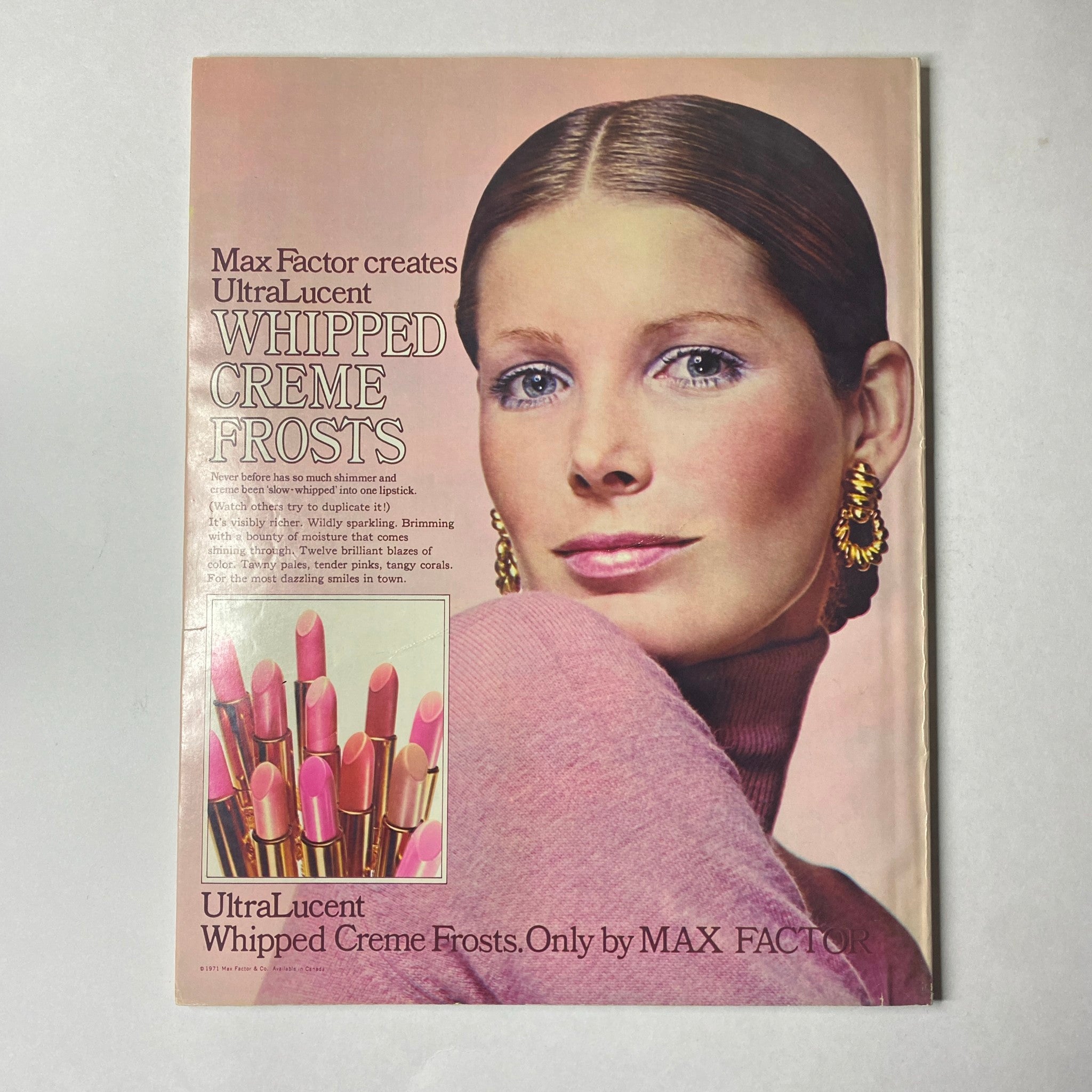Advertisement in Seventeen Magazine April 1971 Superscenics USA Special Travel Issue showcasing Max Factor UltraLucent Whipped Creme Frosts with a model highlighting vibrant lipstick colors.