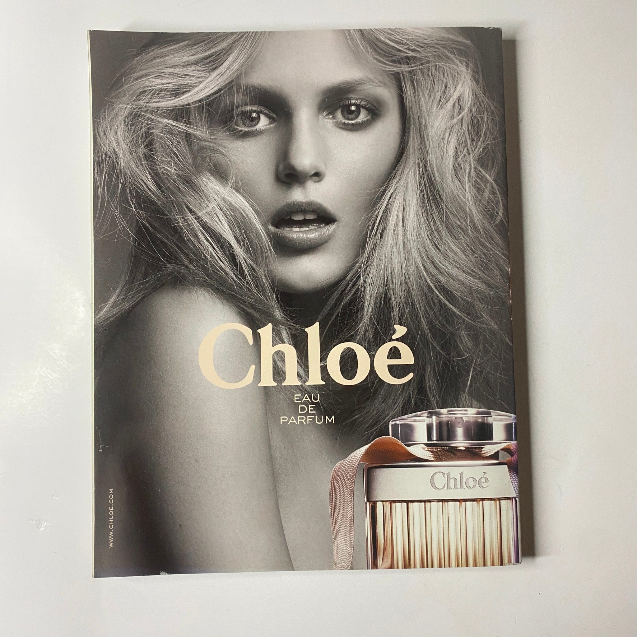 Elle UK Magazine March 2010 cover featuring Chloe Eau de Parfum advertisement, highlighting the model's beauty and the iconic fragrance.