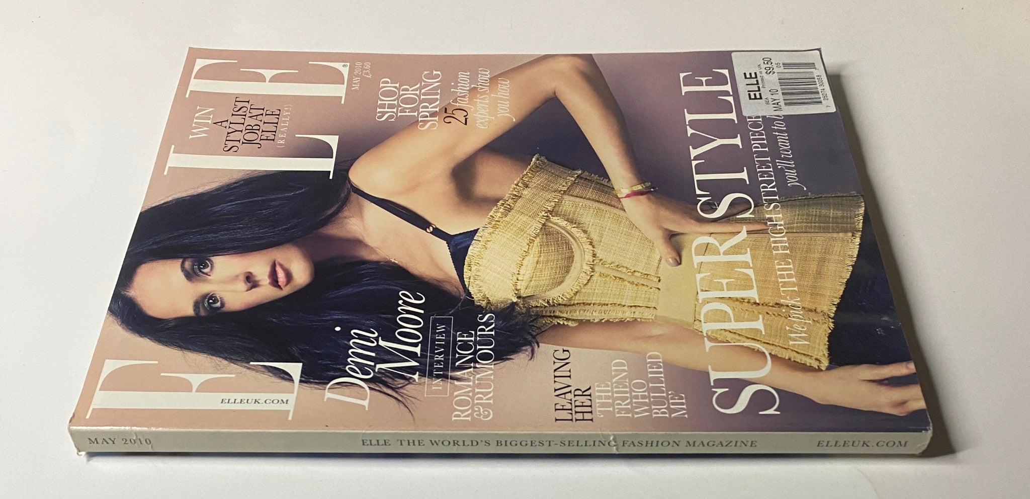 Side view of Elle UK Magazine May 2010 with Demi Moore on the cover, emphasizing fashion insights and editorial features.
