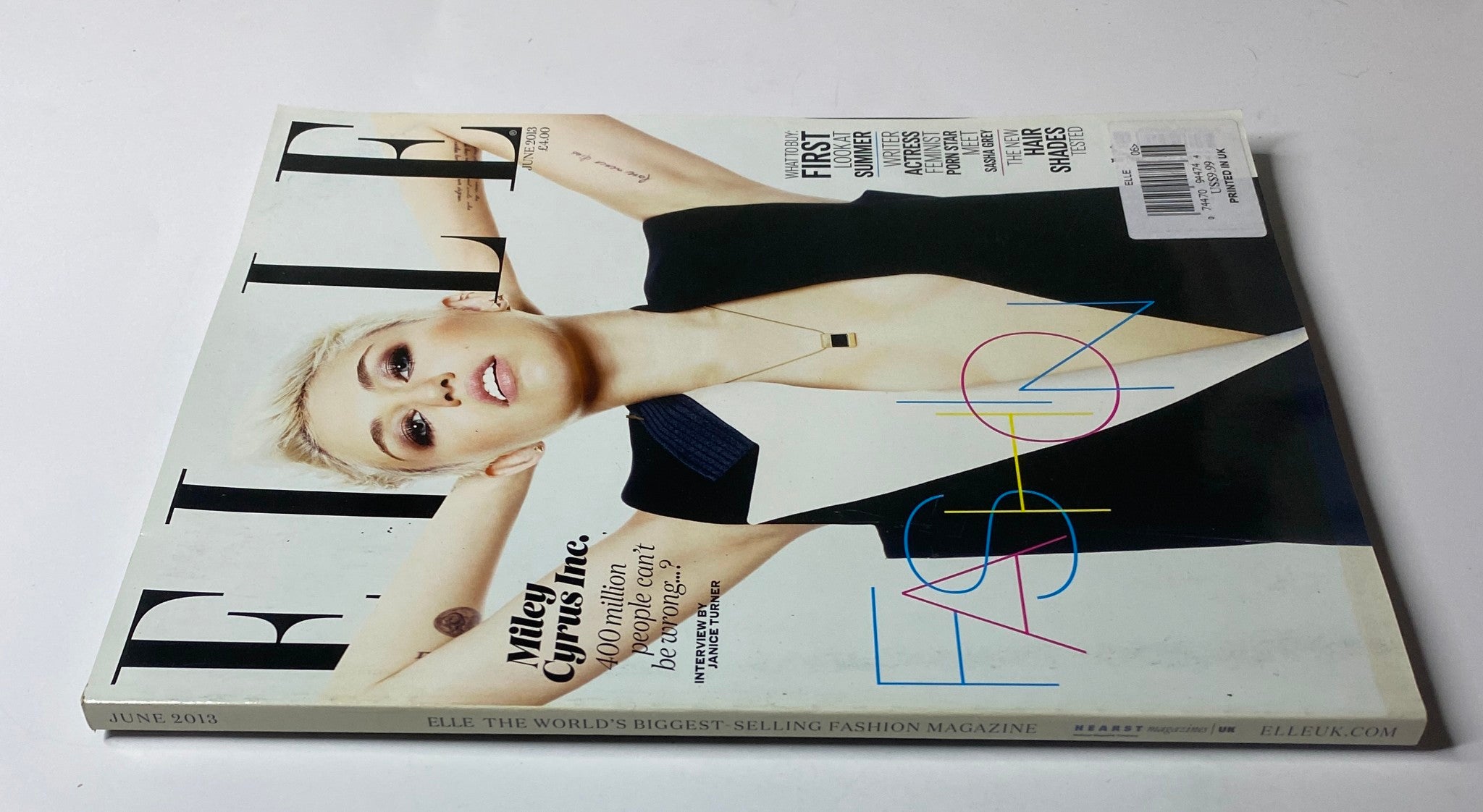 Another angle of the Elle UK Magazine June 2013 with Miley Cyrus on the cover showcasing her iconic look for the summer issue.