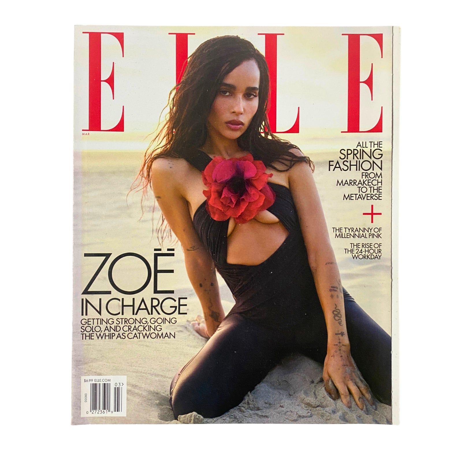 Elle Magazine March 2022 cover featuring Zoë Kravitz in a black Saint Laurent catsuit, adorned with a large red flower, emphasizing fashion and style.