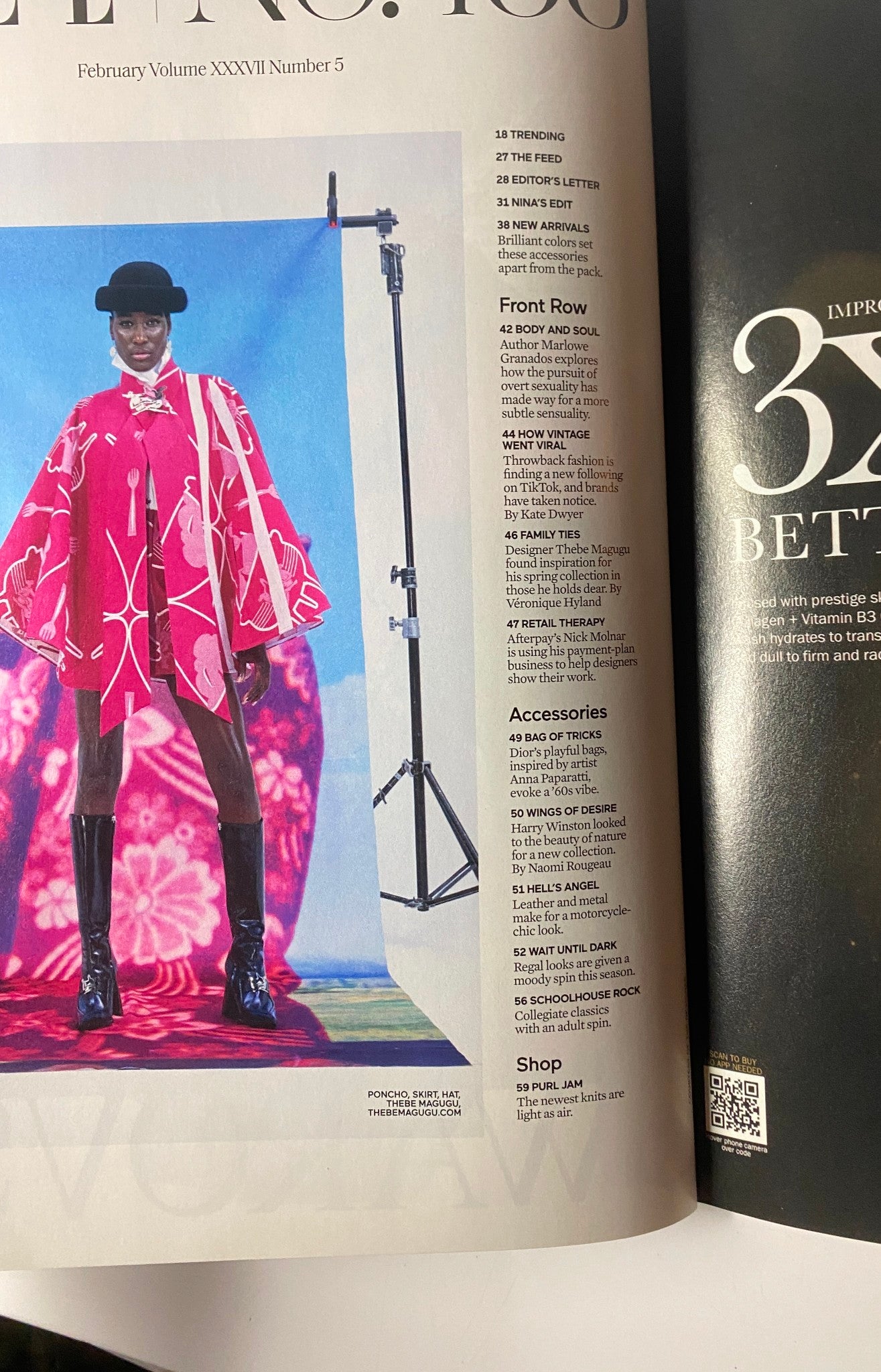 Inside page of Elle Magazine February 2022 presenting a bold fashion ensemble worn by a model, highlighting contemporary trends.