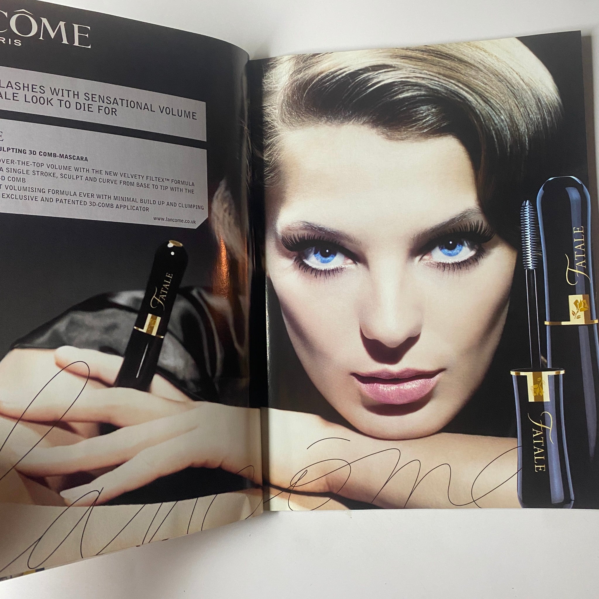 A beauty advertisement from Image UK Magazine August 2006, presenting a glamorous model with striking blue eyes and a luxurious mascara.