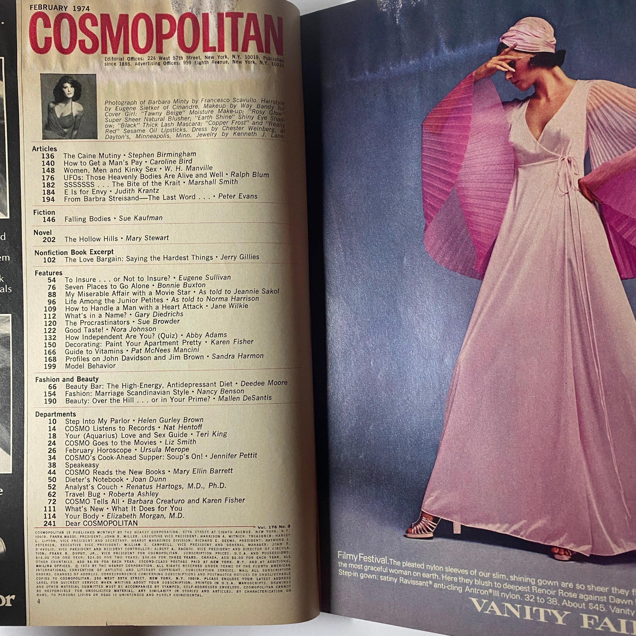 Inside page of Cosmopolitan Magazine February 1974, featuring the table of contents alongside a fashion editorial image, showcasing the blend of articles in this vintage edition.
