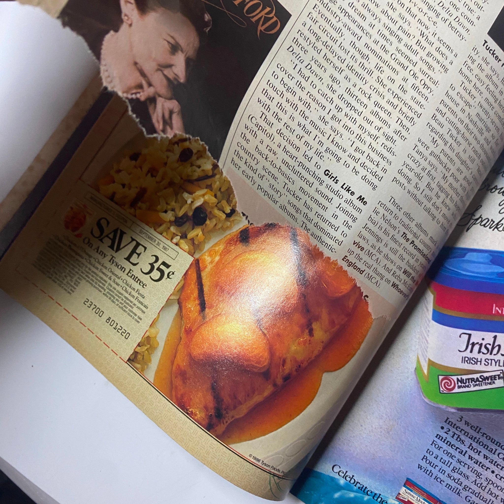 Interior page from the July 1986 Cosmopolitan Magazine displaying vintage advertisements and articles, including food promotions.
