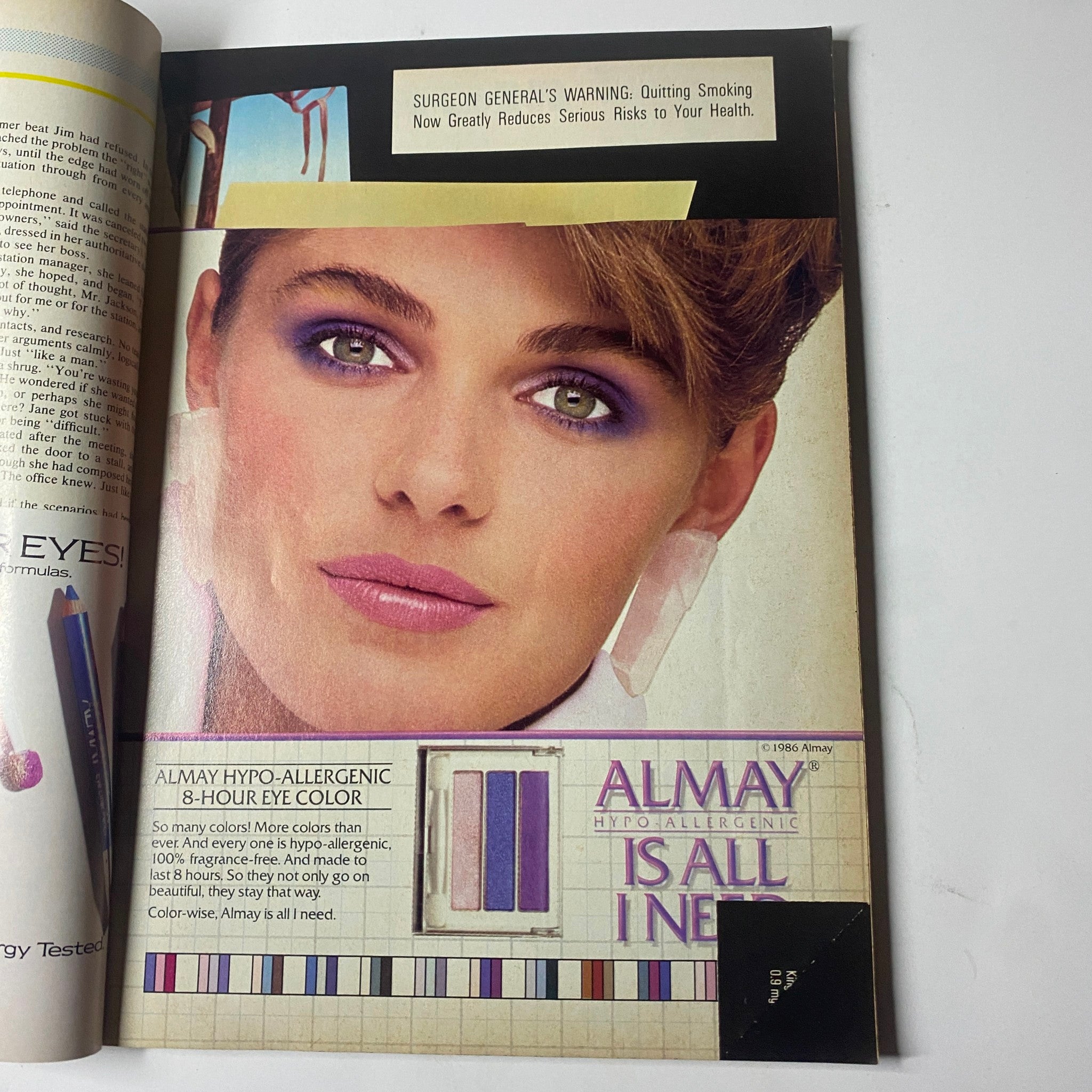 Almay advertisement featuring a model with striking eye makeup, showcasing Almay Hypo-Allergenic 8-Hour Eye Color in the July 1986 Cosmopolitan Magazine with Paulina Porizkova cover.