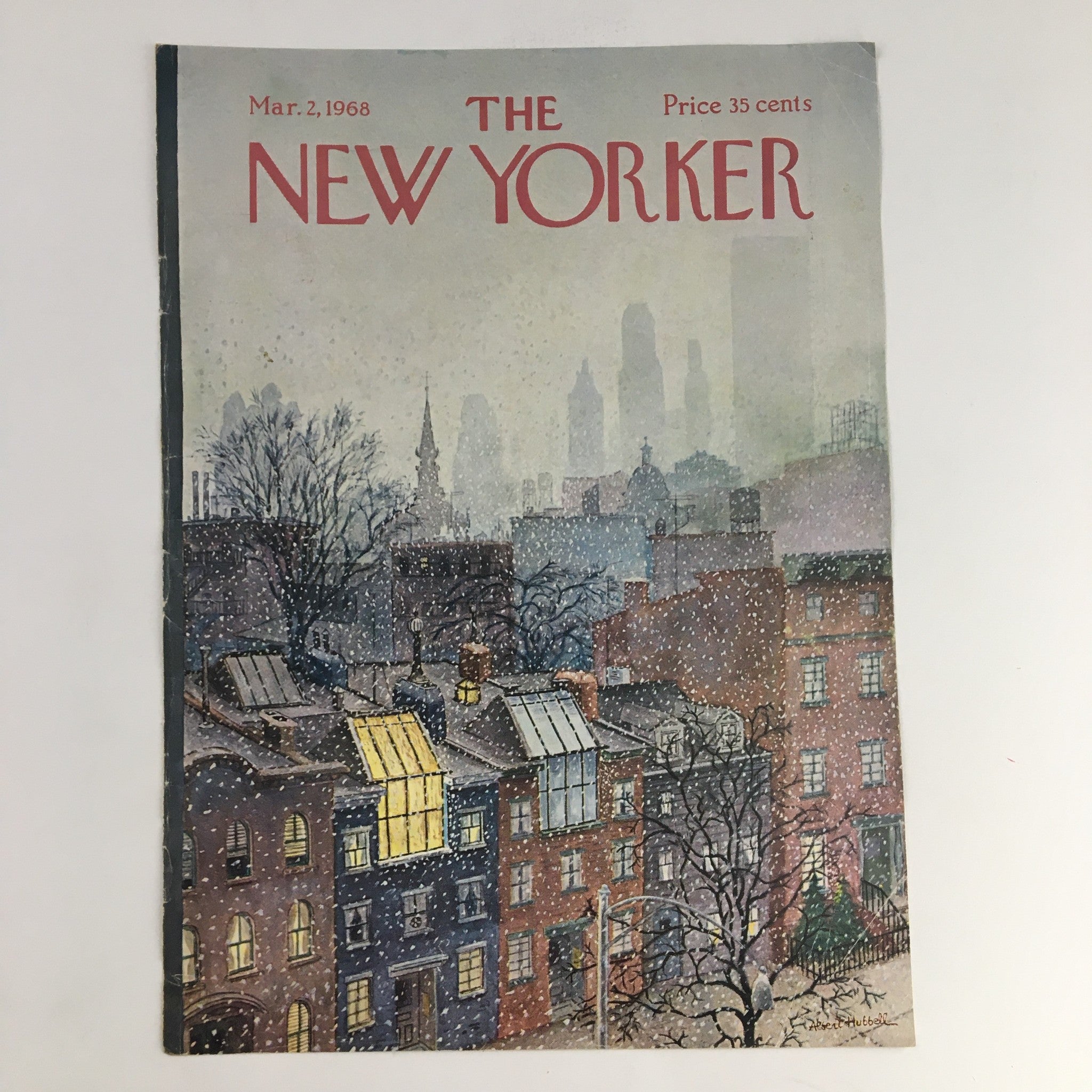 March 2, 1968 cover of The New Yorker magazine, illustrated by Albert Hubbell, depicting a winter scene with snow falling over buildings and city landmarks.