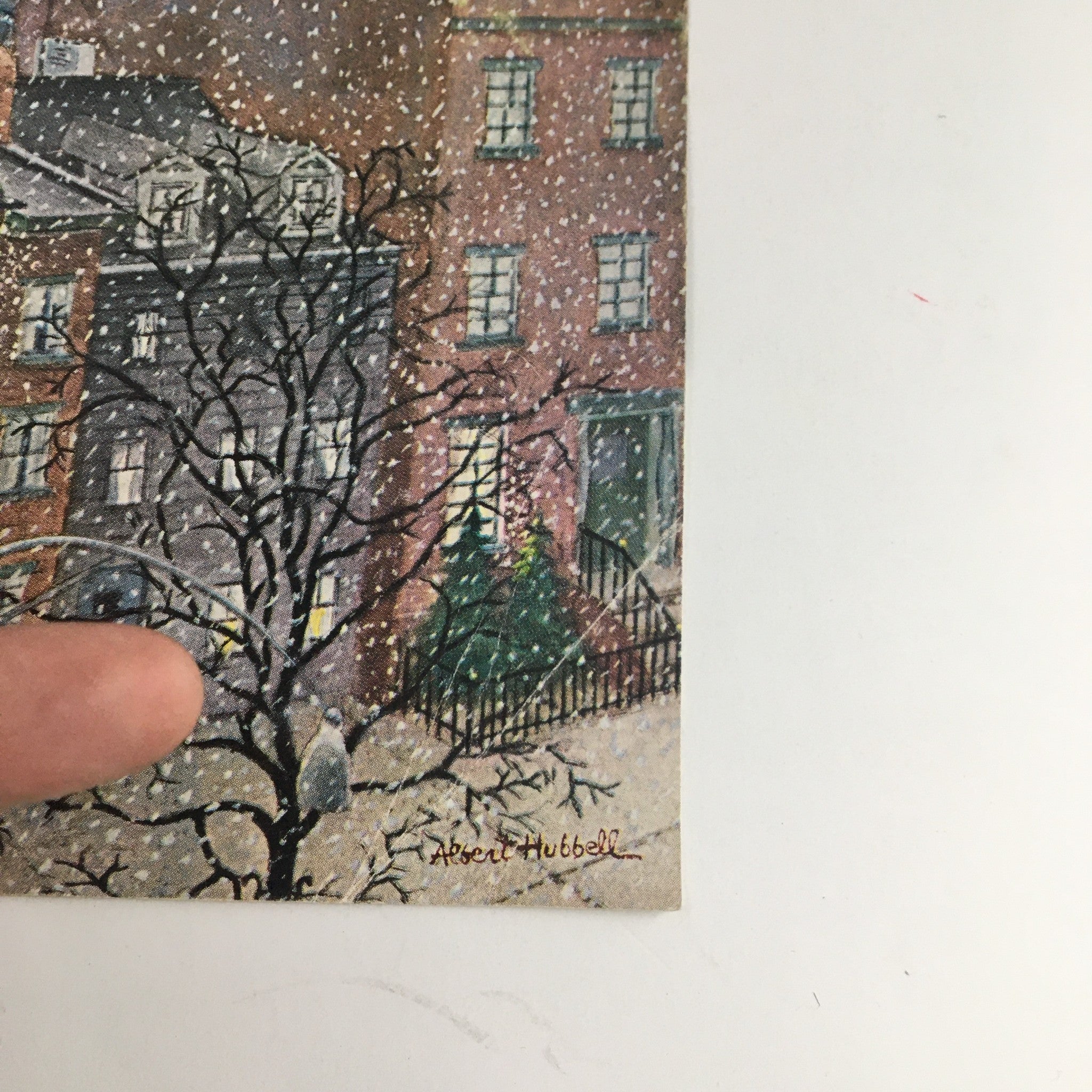 Cover of The New Yorker March 2 1968 featuring winter-themed artwork by Albert Hubbell, showcasing snow falling on historic buildings and a tree in the foreground.